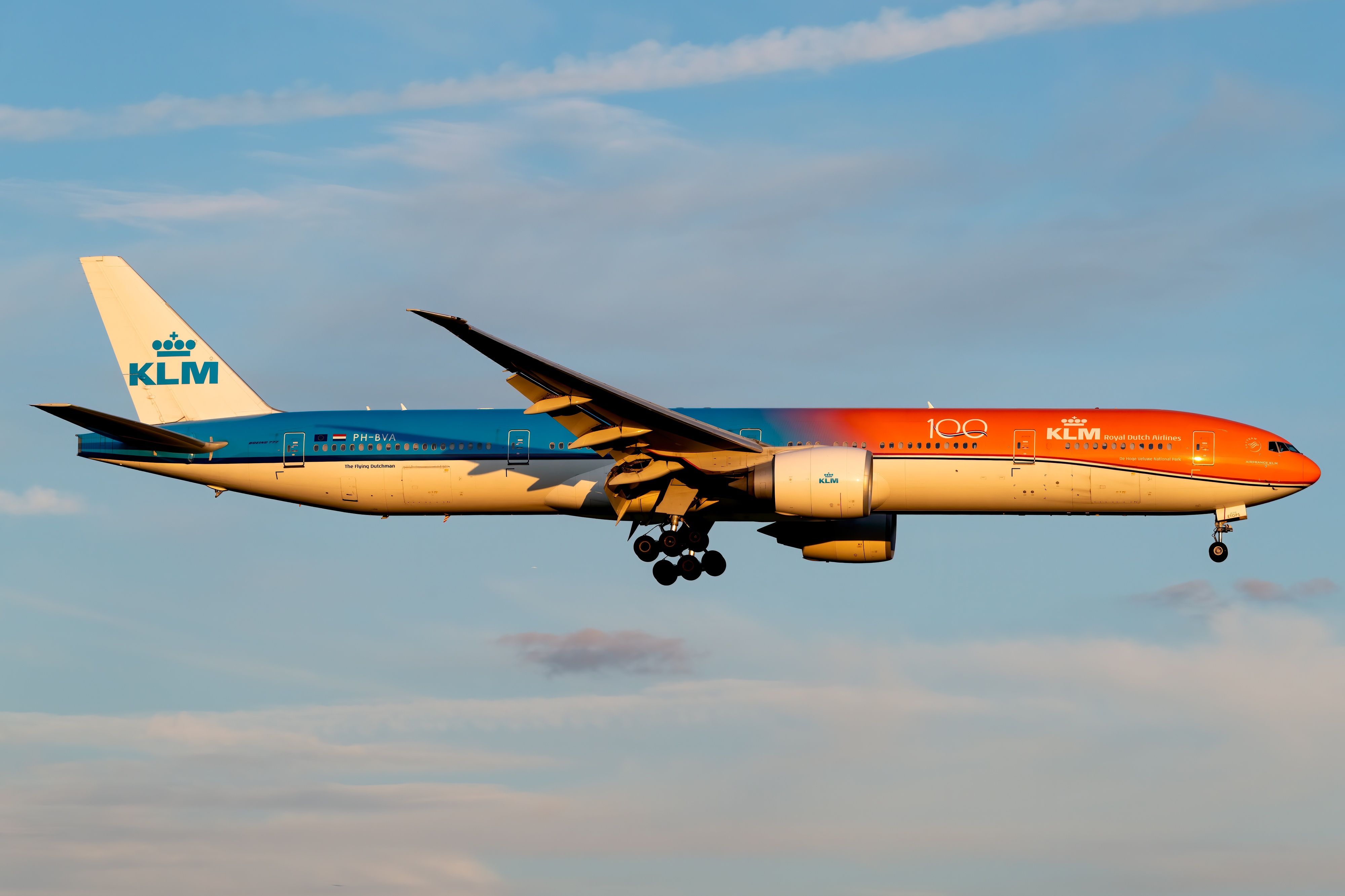 KLM Boeing 777-300ER landing with the Orange Pride Livery.