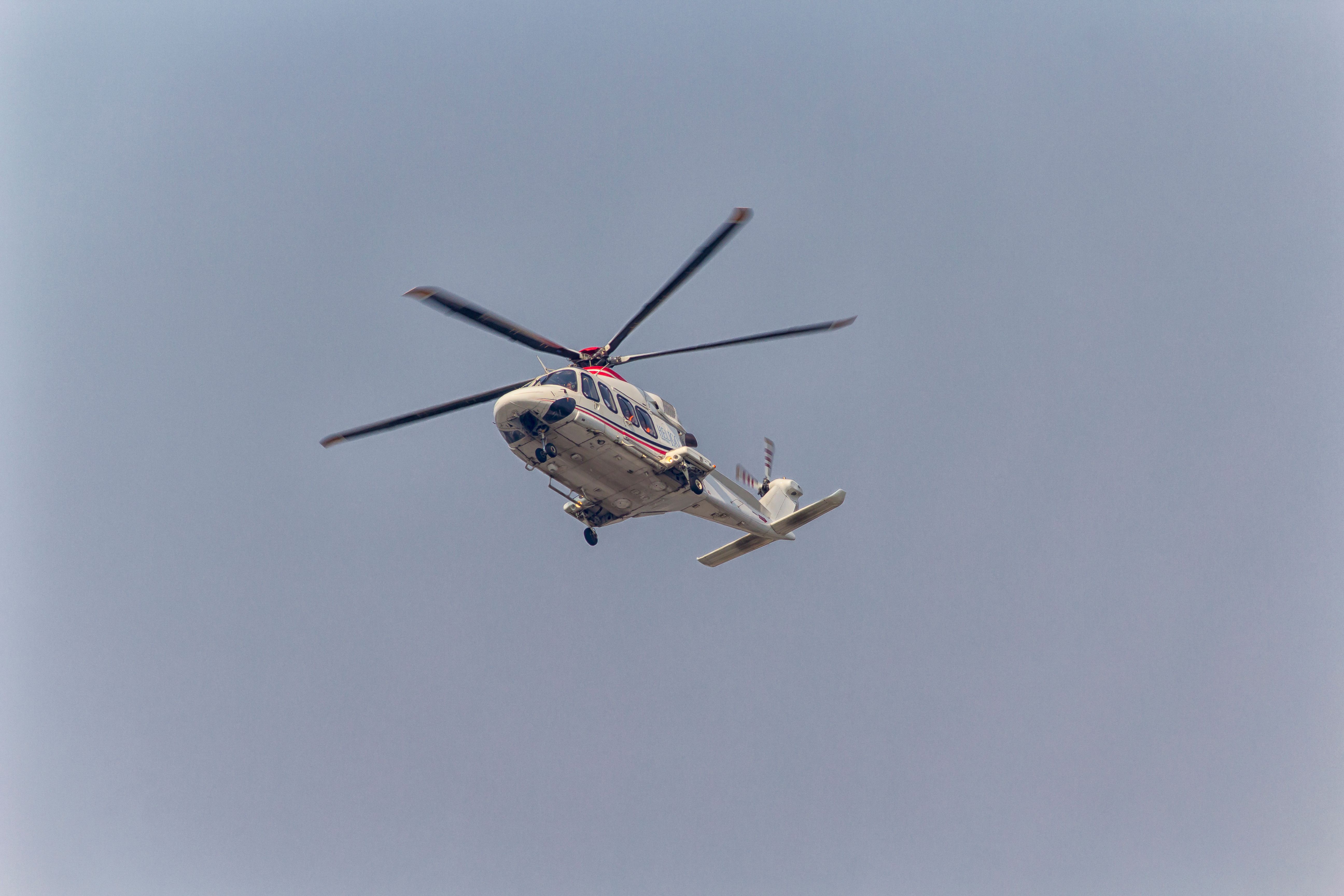 An AW139 Helicopter flying in the sky.