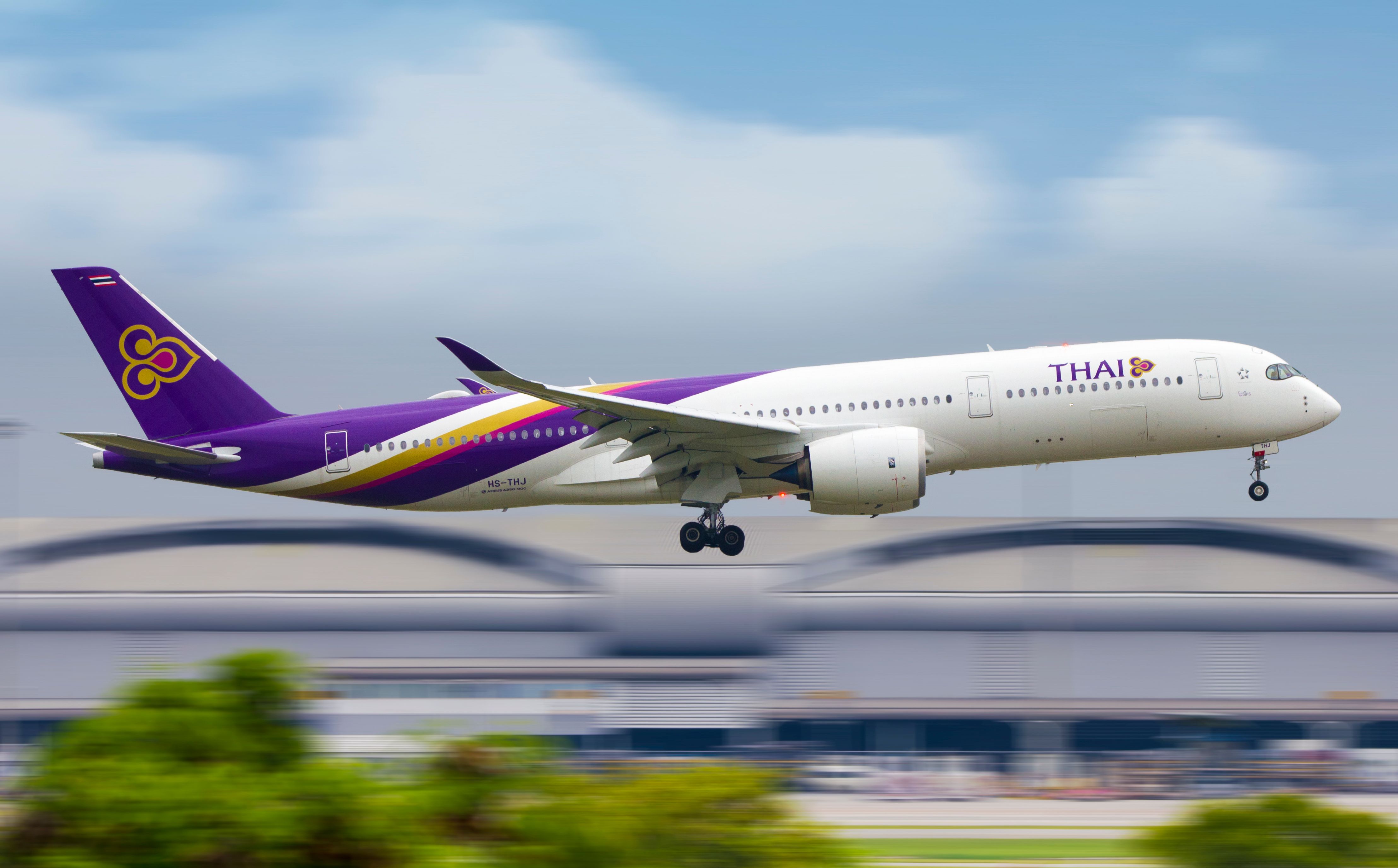 A Thai Airways Airbus A350 about to land.