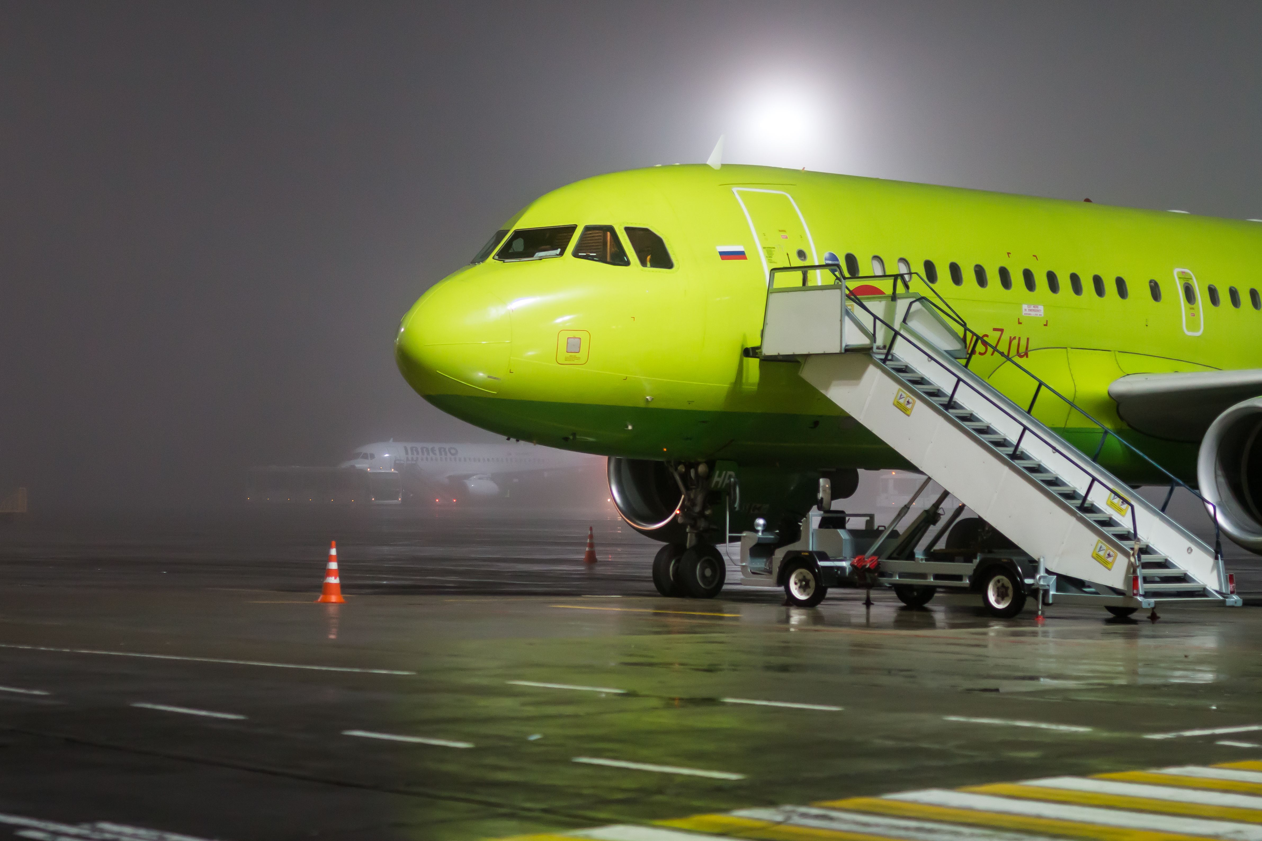 A S7 Airlines A320 parked at an airport