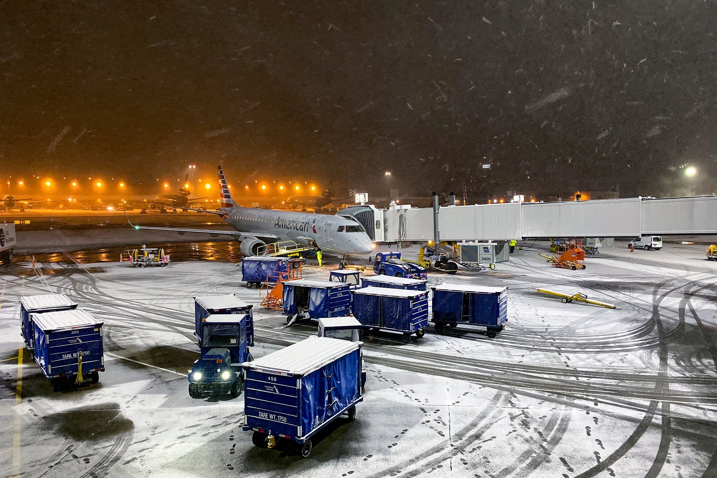 American Airlines Embraer E-Jet Parked In Snowy Conditions