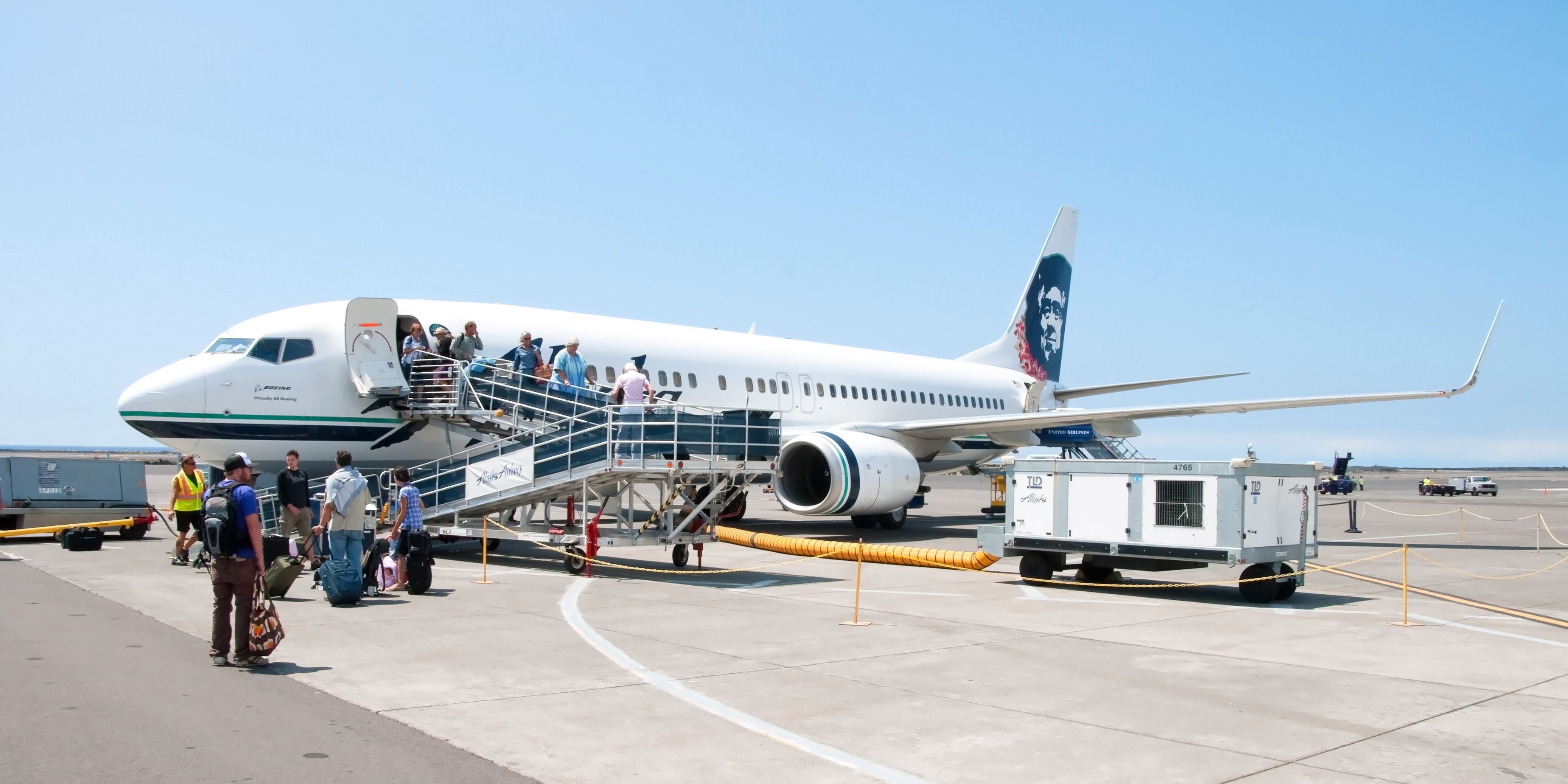 shutterstock_164237087 - KONA, HAWAII - SEPTEMBER 6, 2011 - Boeing Alaska Airlines ready to boarding in Kona at Keahole airport on September 6, 2011 in Kona, Hawaii.