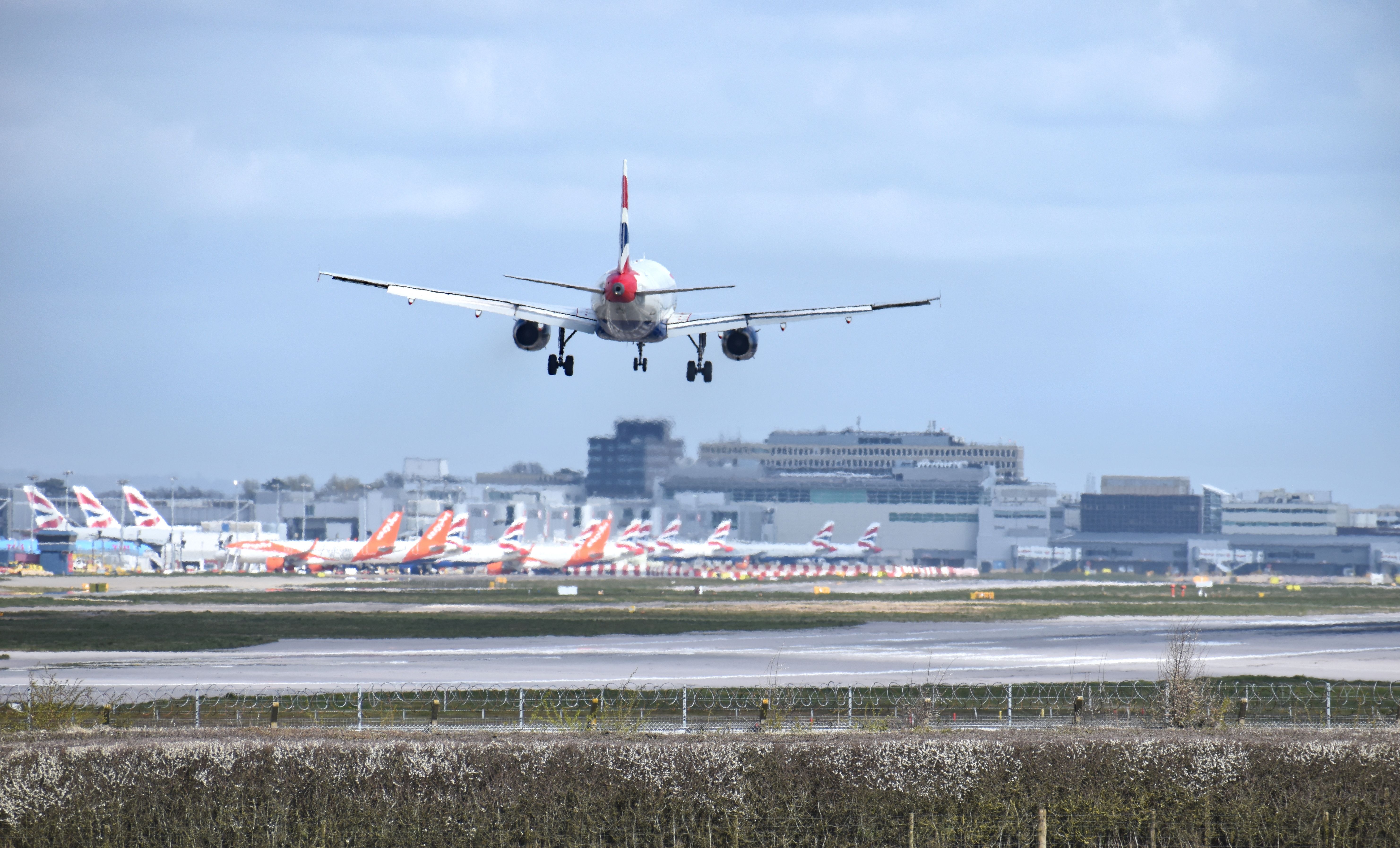 A BA plane lands at Gatwick Airport