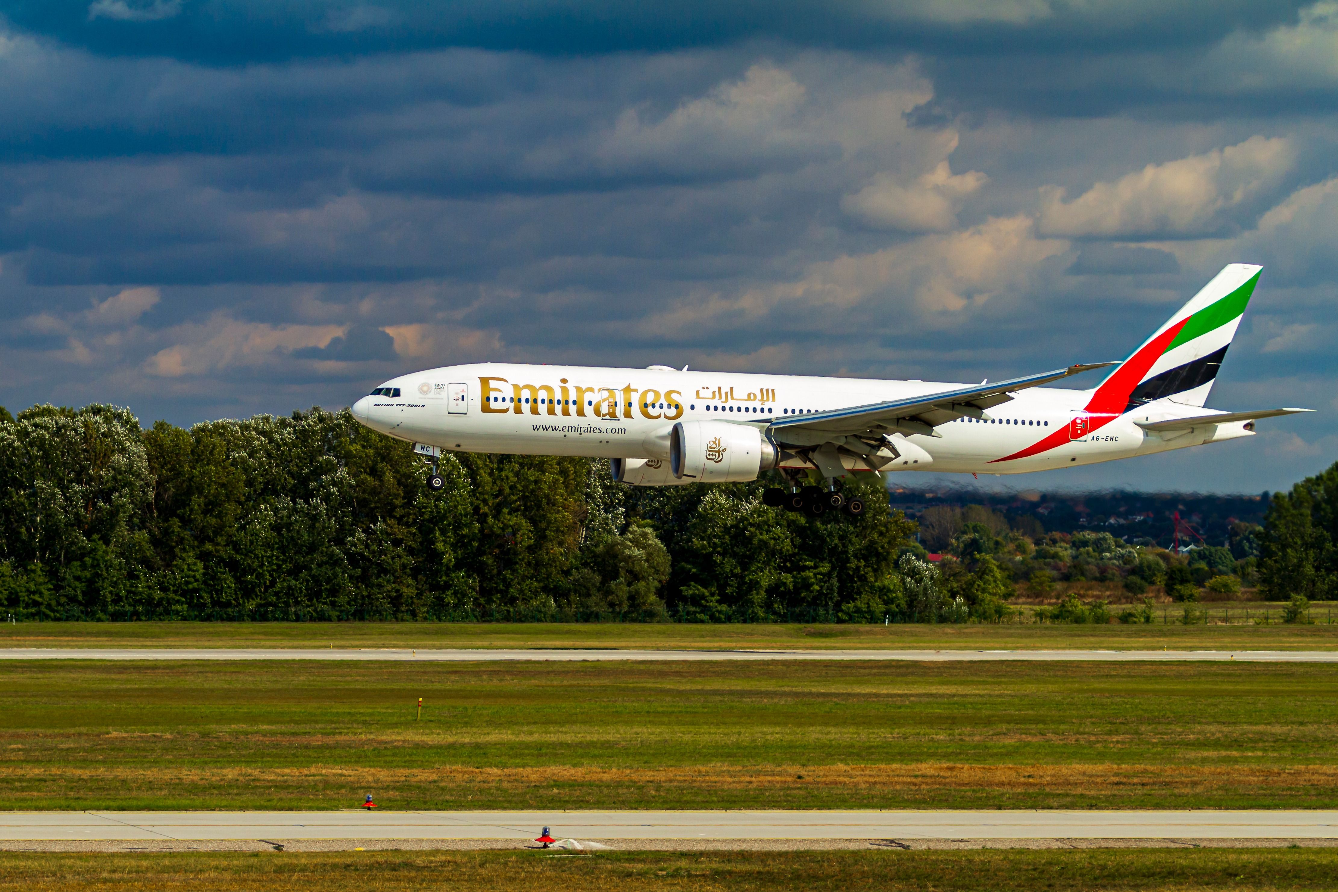 Emirates Boeing 777-200LR A6-EWC landing in Budapest, Hungary. 