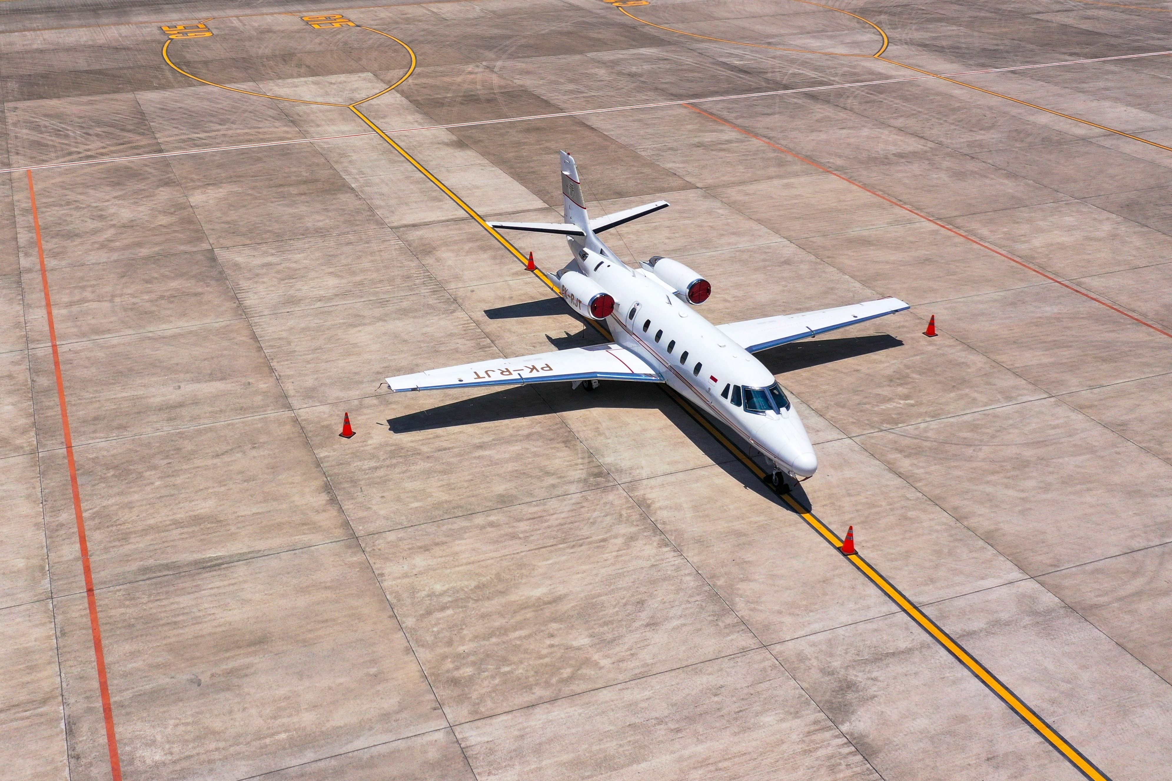 A Cessna 560 XLS parked on an airport apron.