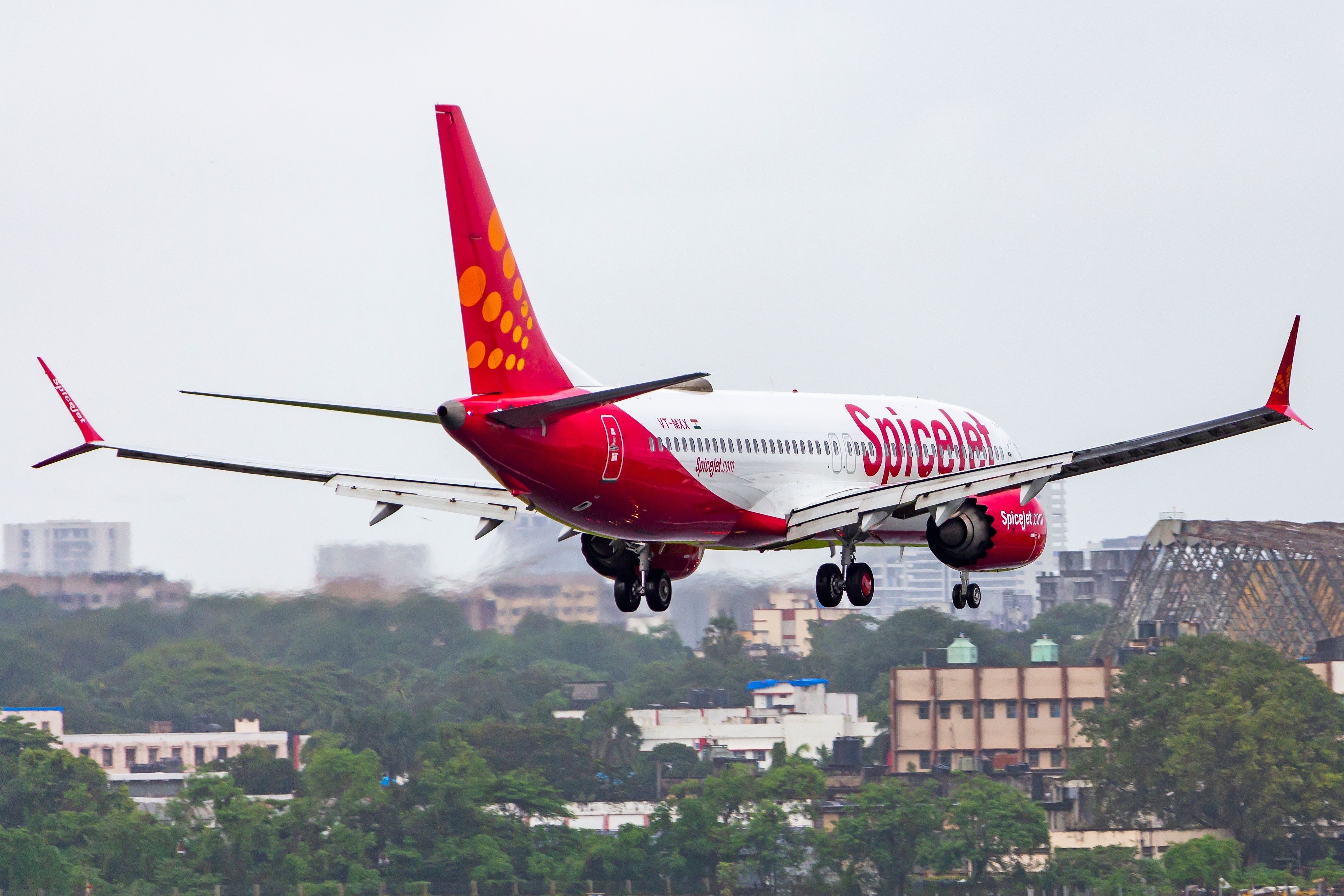 SpiceJet's Boeing 737 MAX 8 approaching the runway at Mumbai Airport.