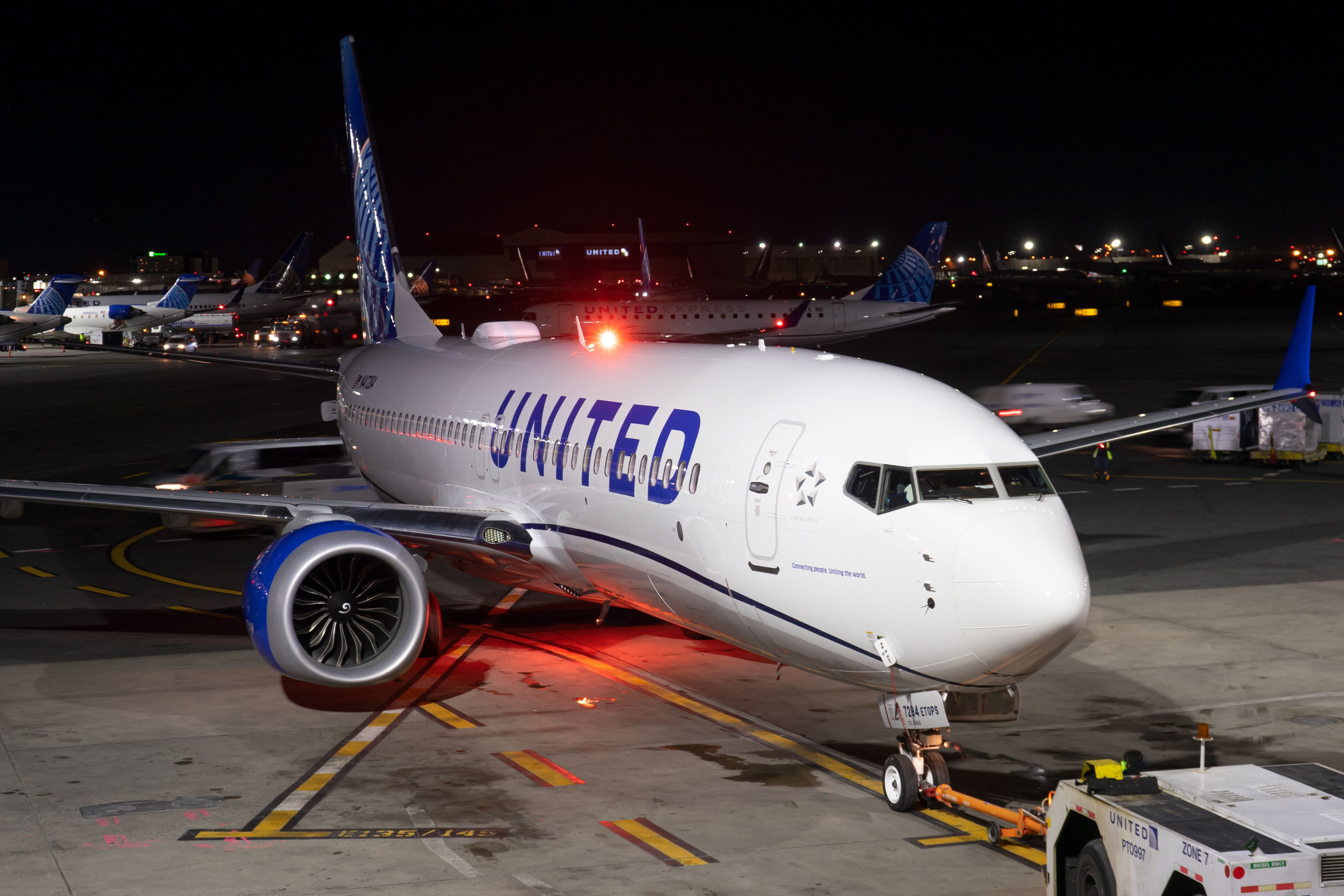 United Airlines Boeing 737 MAX being pushed back at the gate.