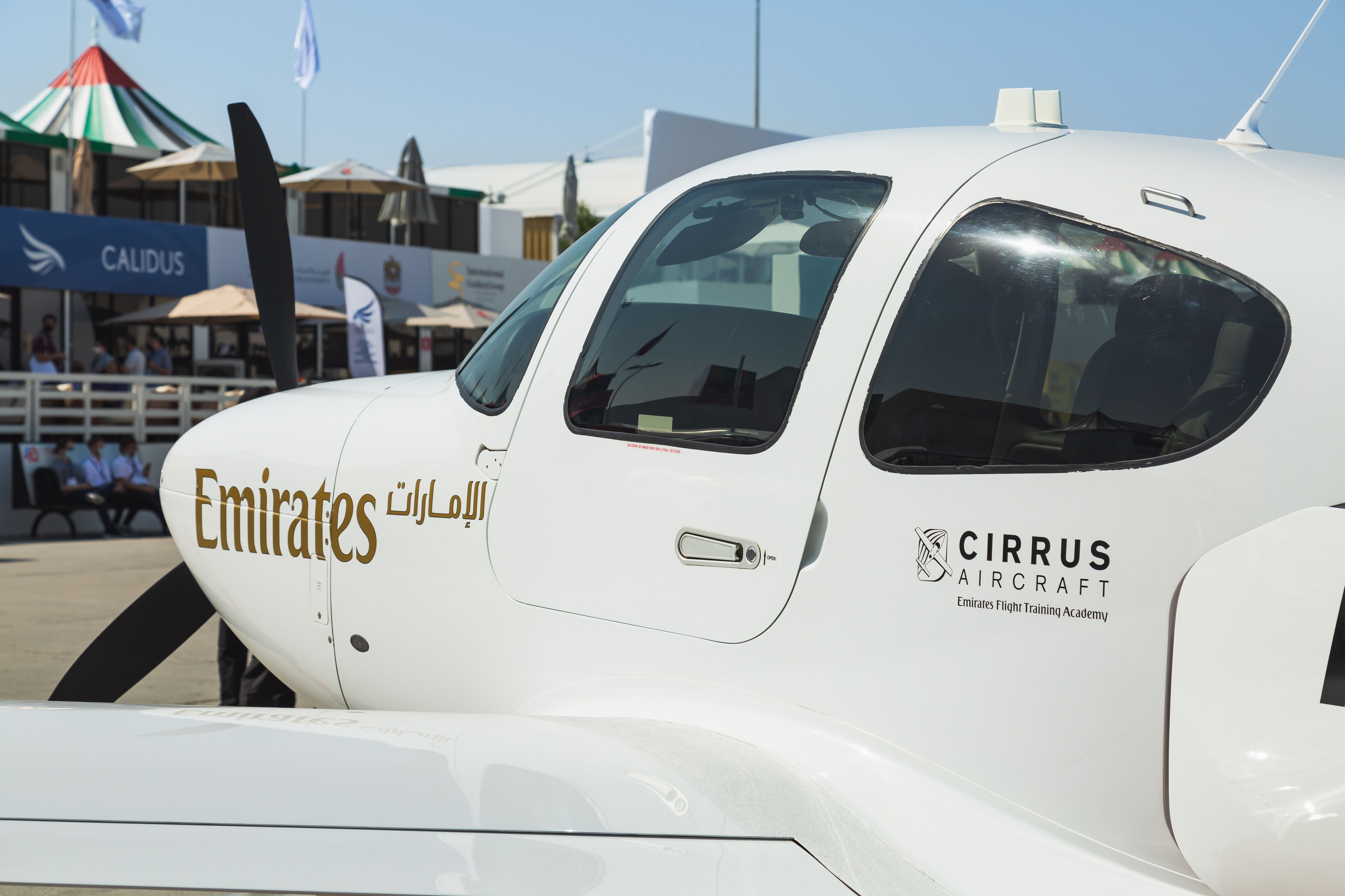 An Emirates Cirrus SR22 parked on display.