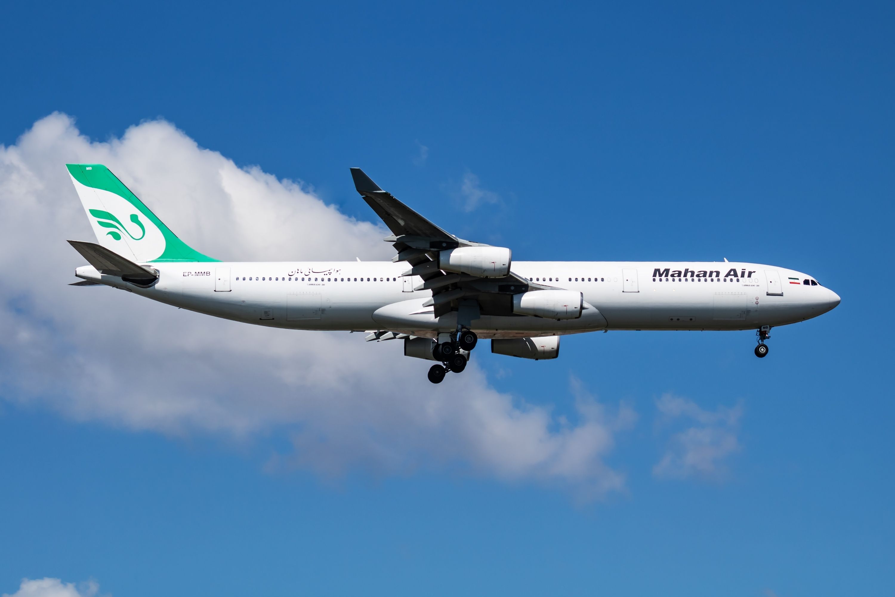 A Mahan Air Airbus A340 Flying in the sky.