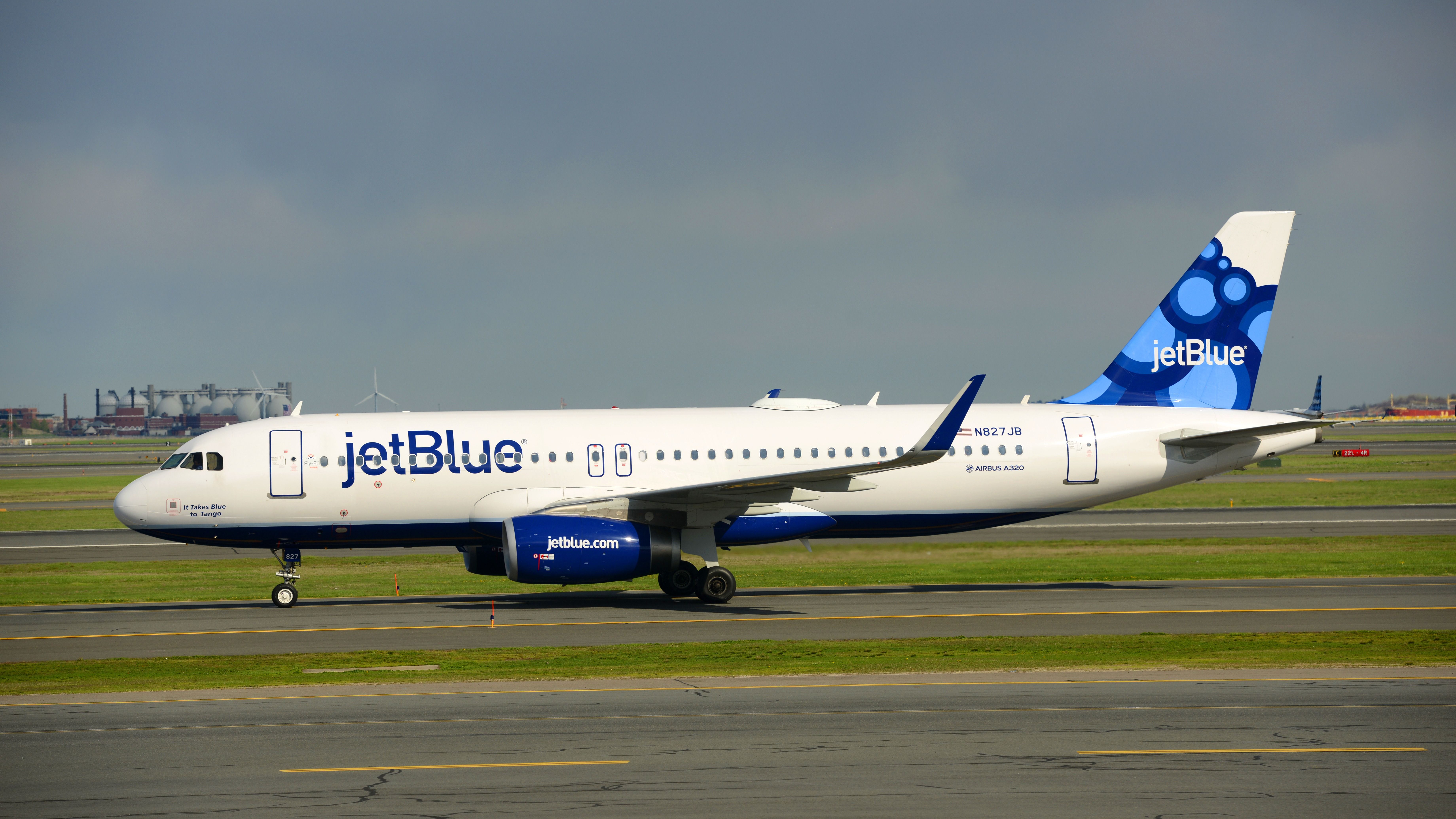 A JetBlue Airways Airbus A320 on the apron at Boston Logan International Airport.