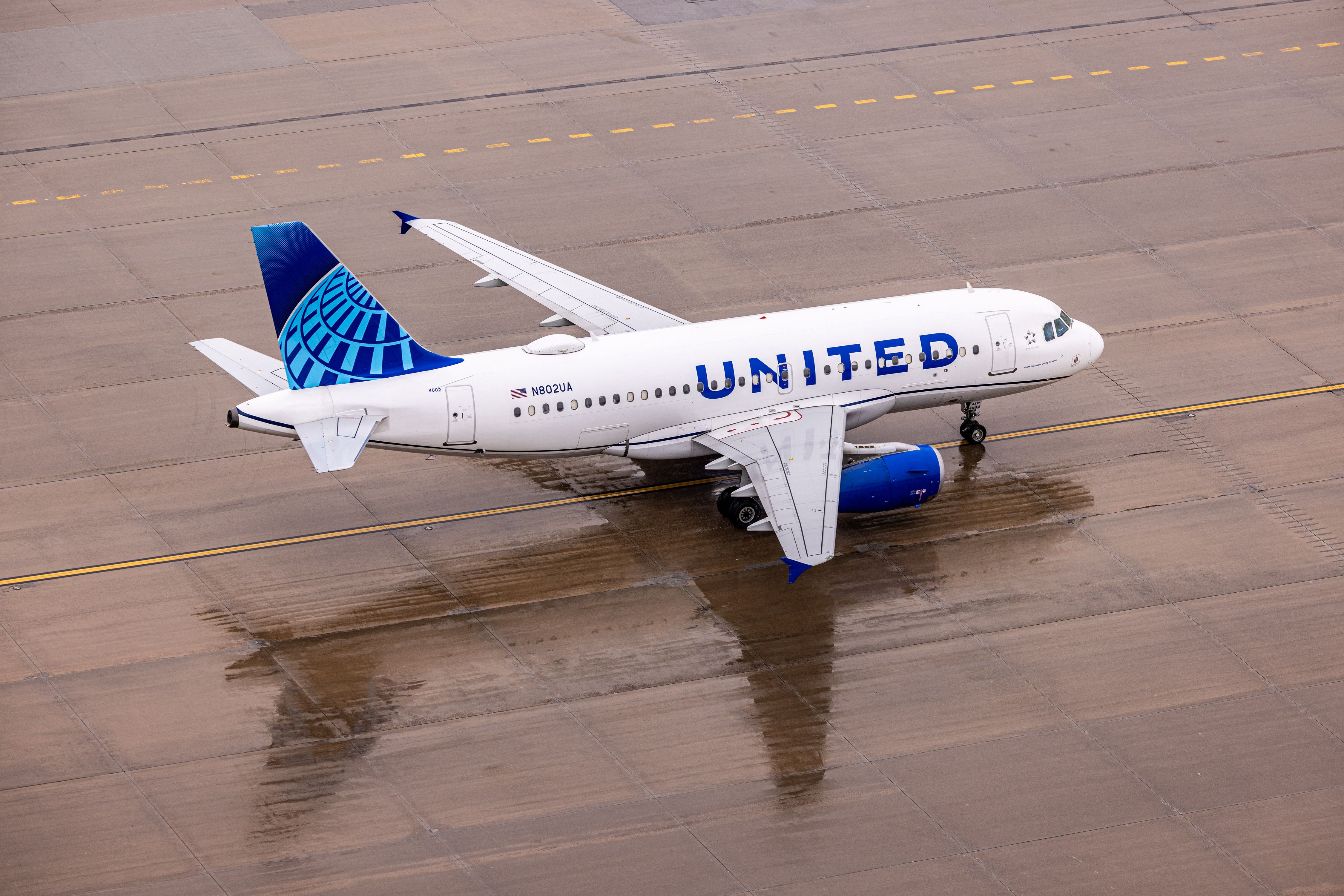 A United Airlines Airbus A319 On the apron At Denver International Airport.