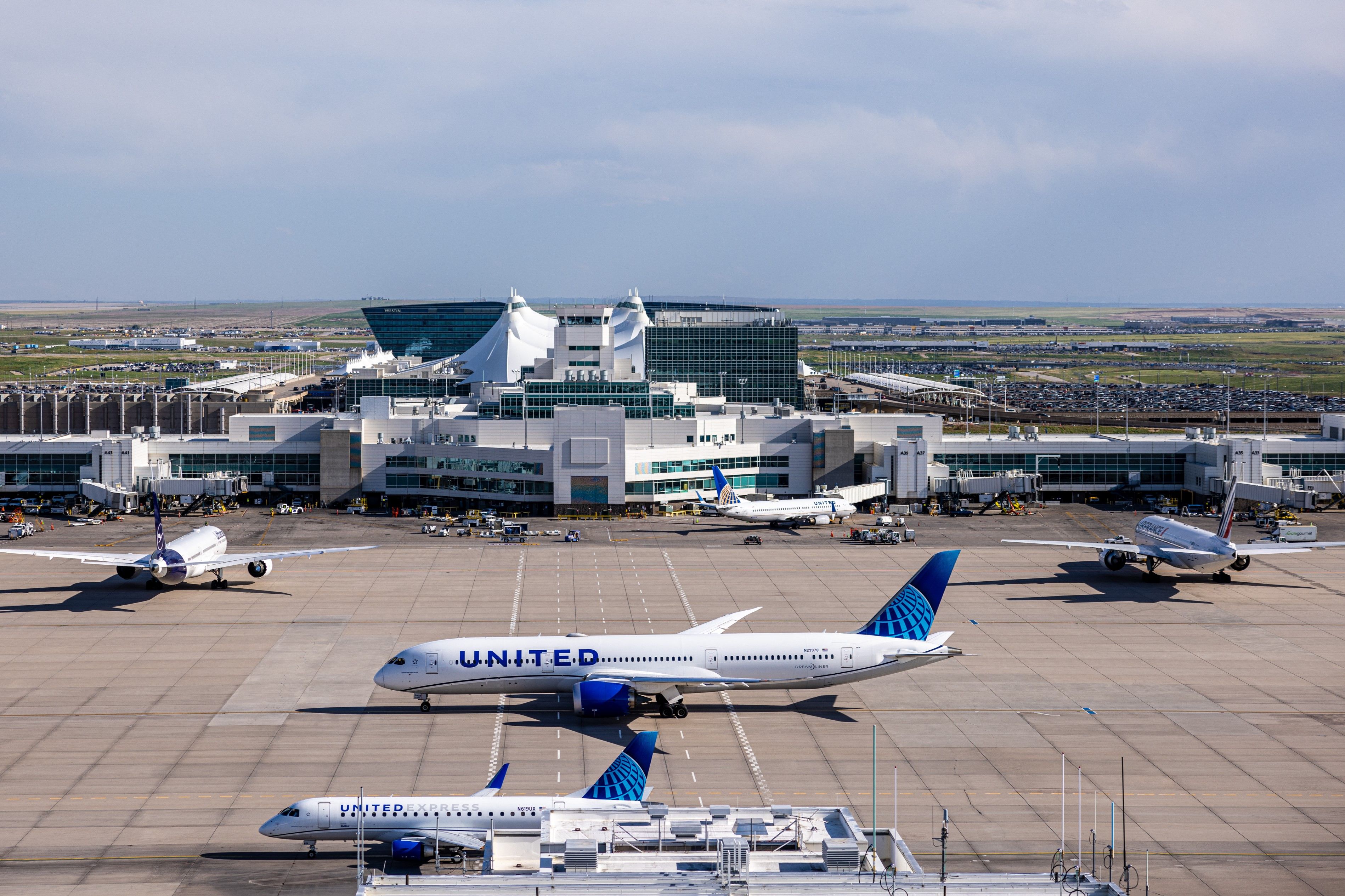 Several United Airlines Aircraft on the apron at Denver International Airport.