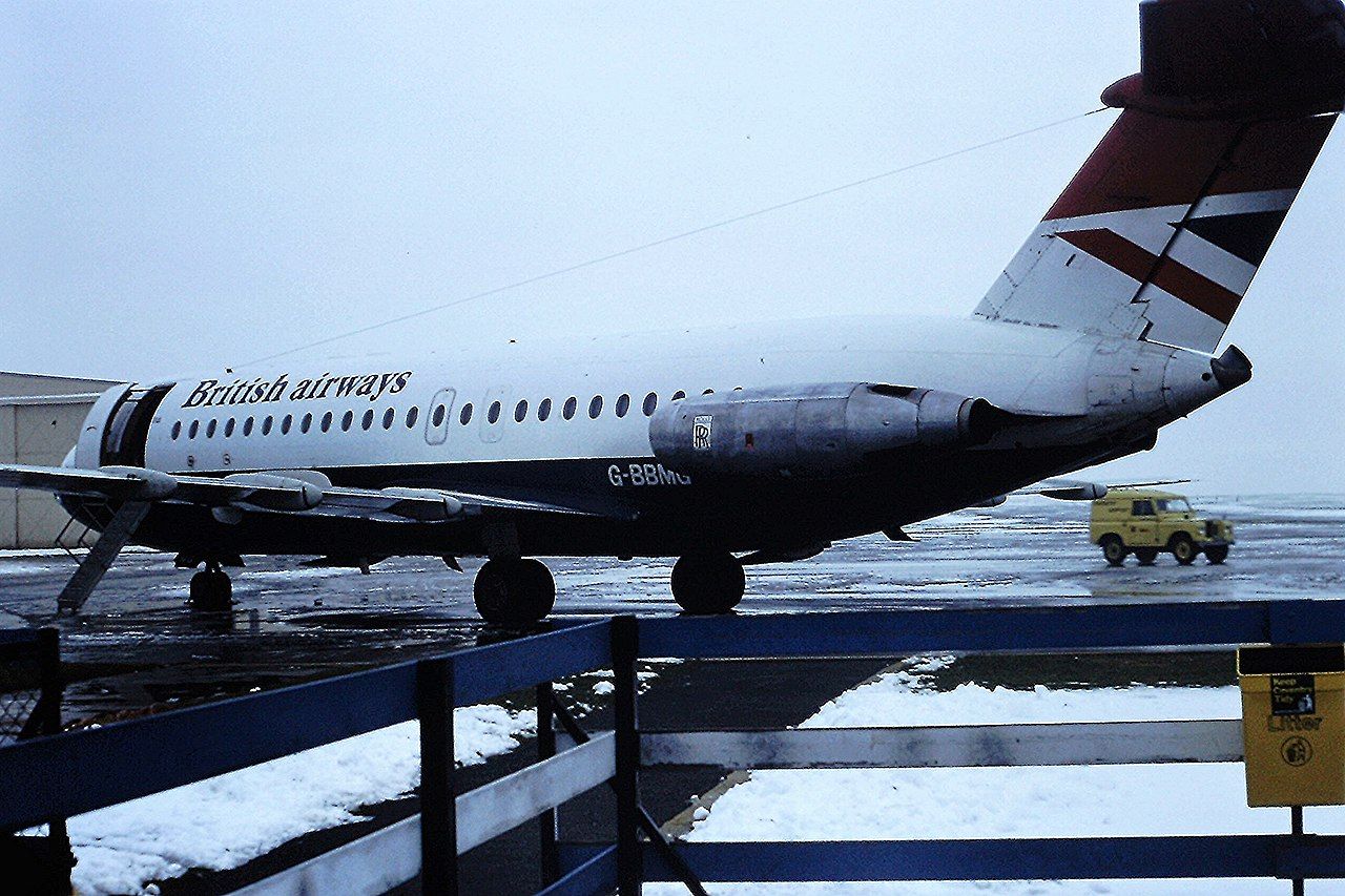 A British Airways BAC 1-11 on a snowy airport apron.