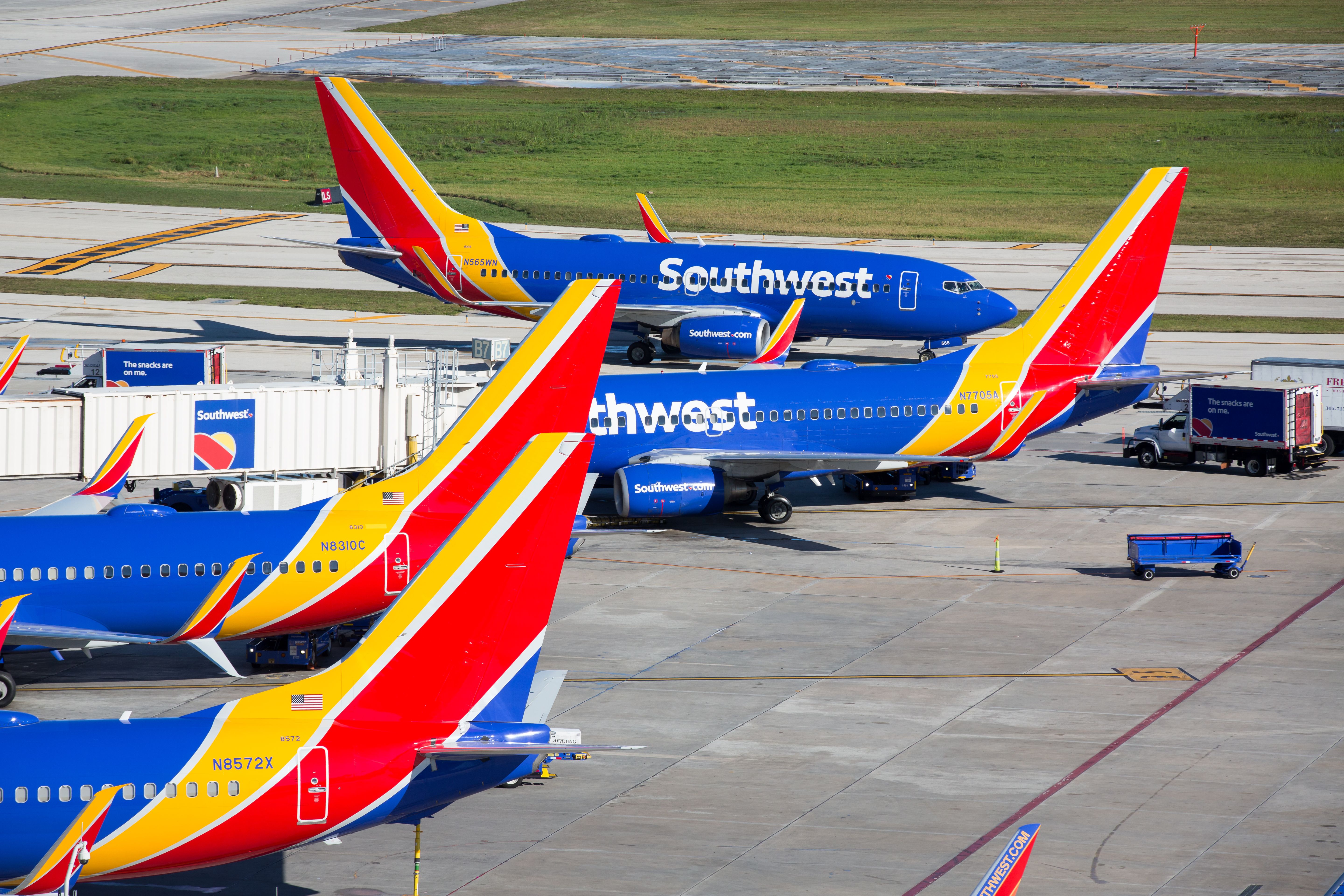 Several Southwest Airlines aircraft on an airport apron.