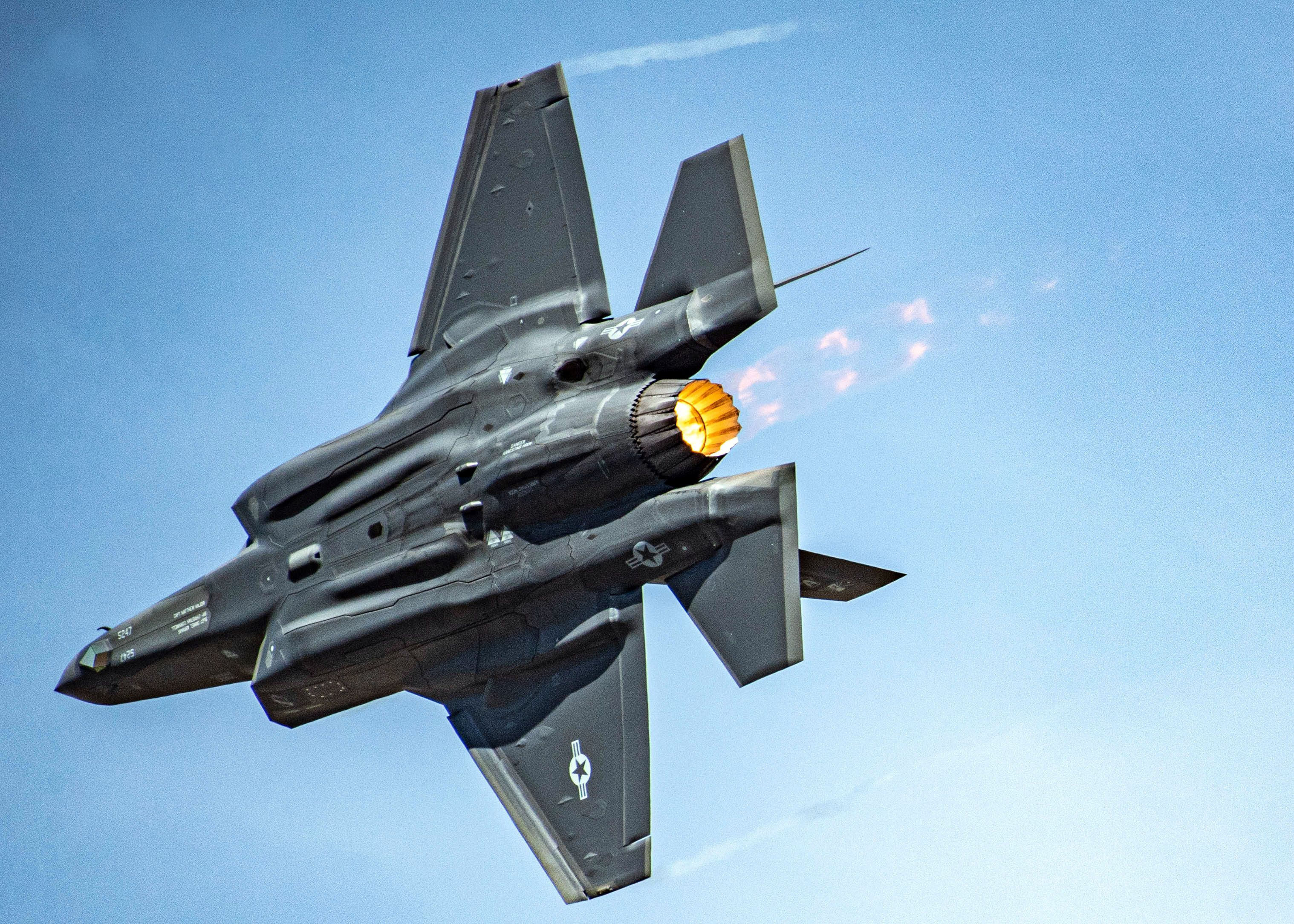 A USAF F-35A flying in the sky.