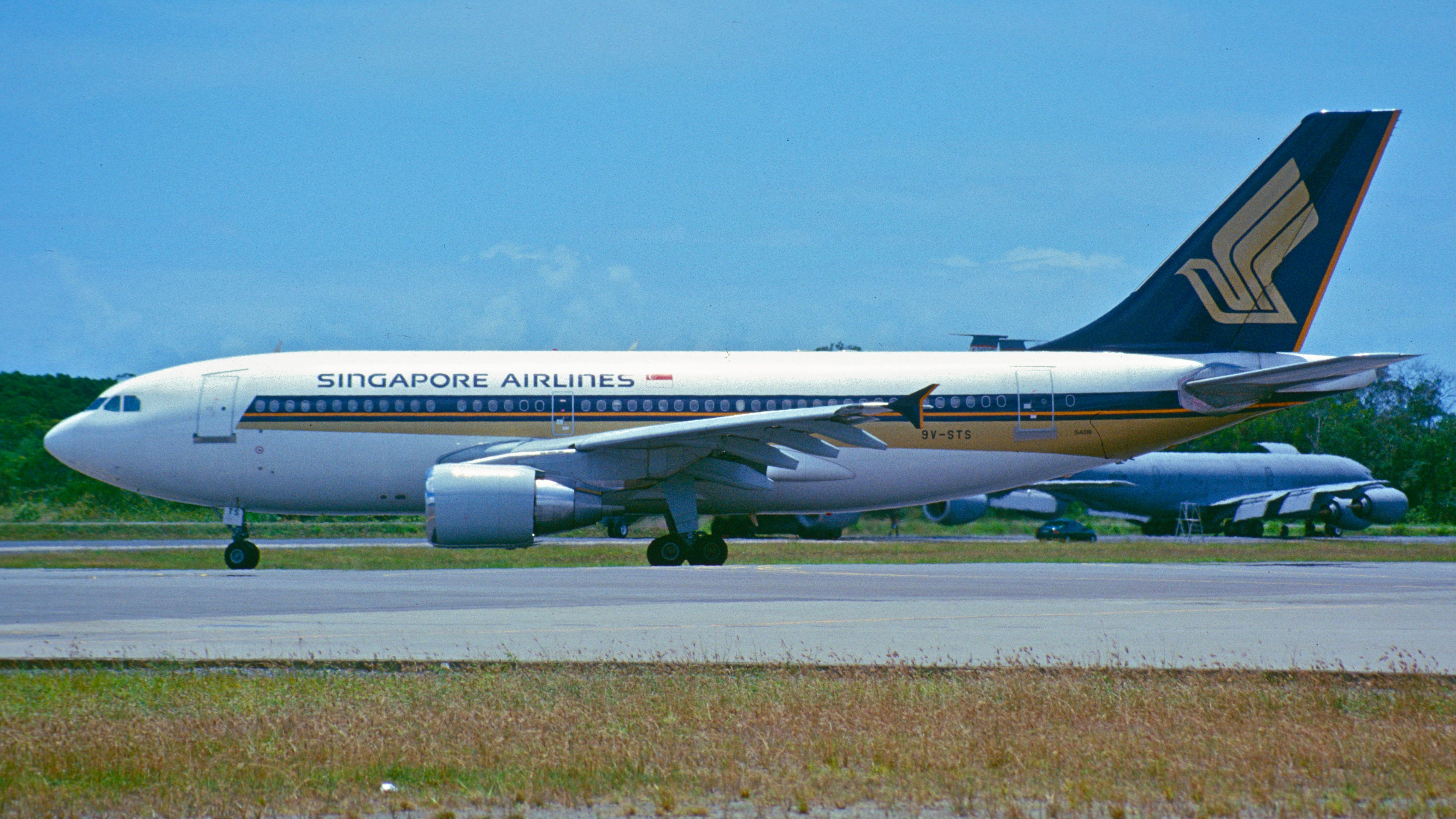 A Singapore Airlines Airbus A310 on an airport apron.
