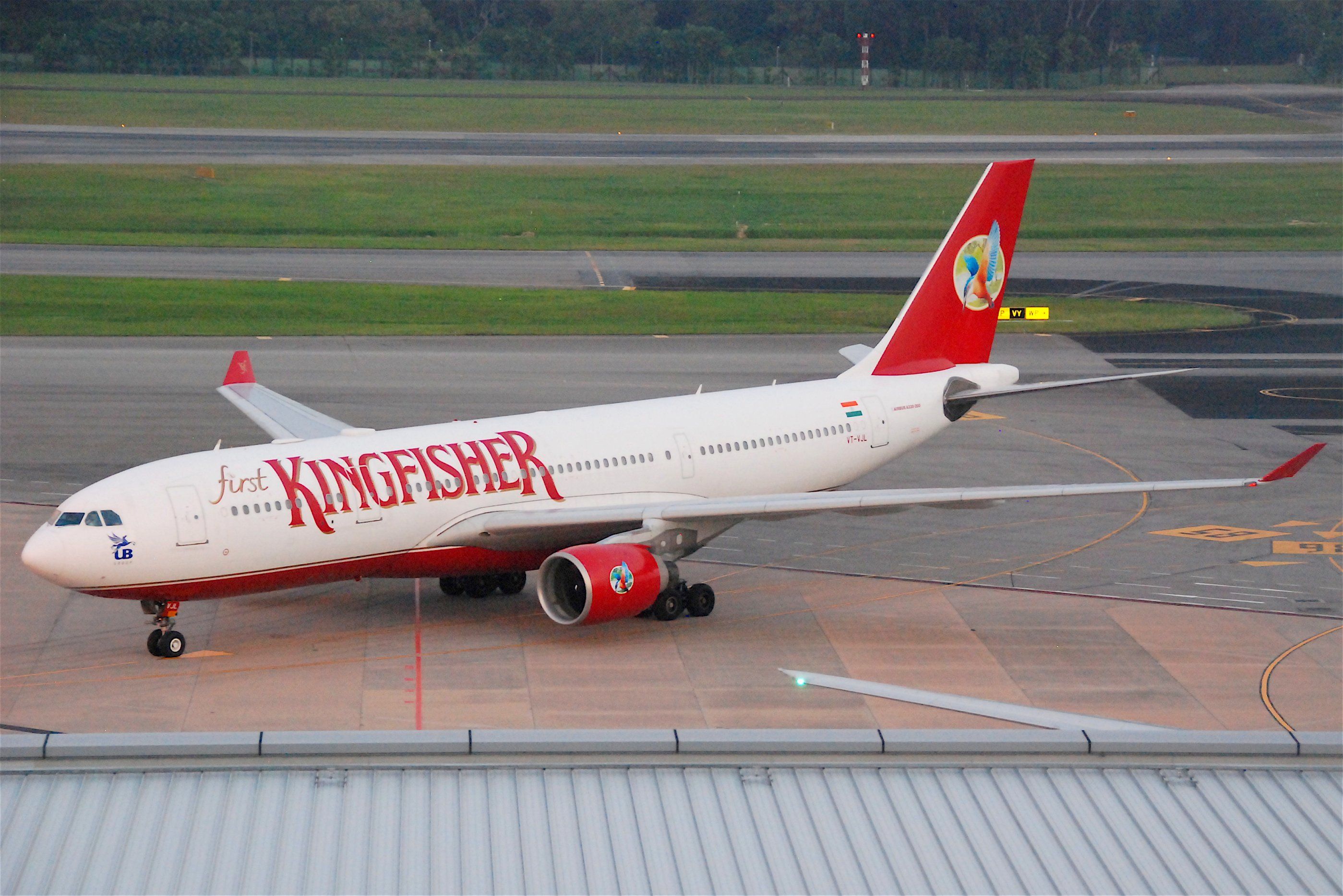 A Kingfisher aircraft on an airport apron.