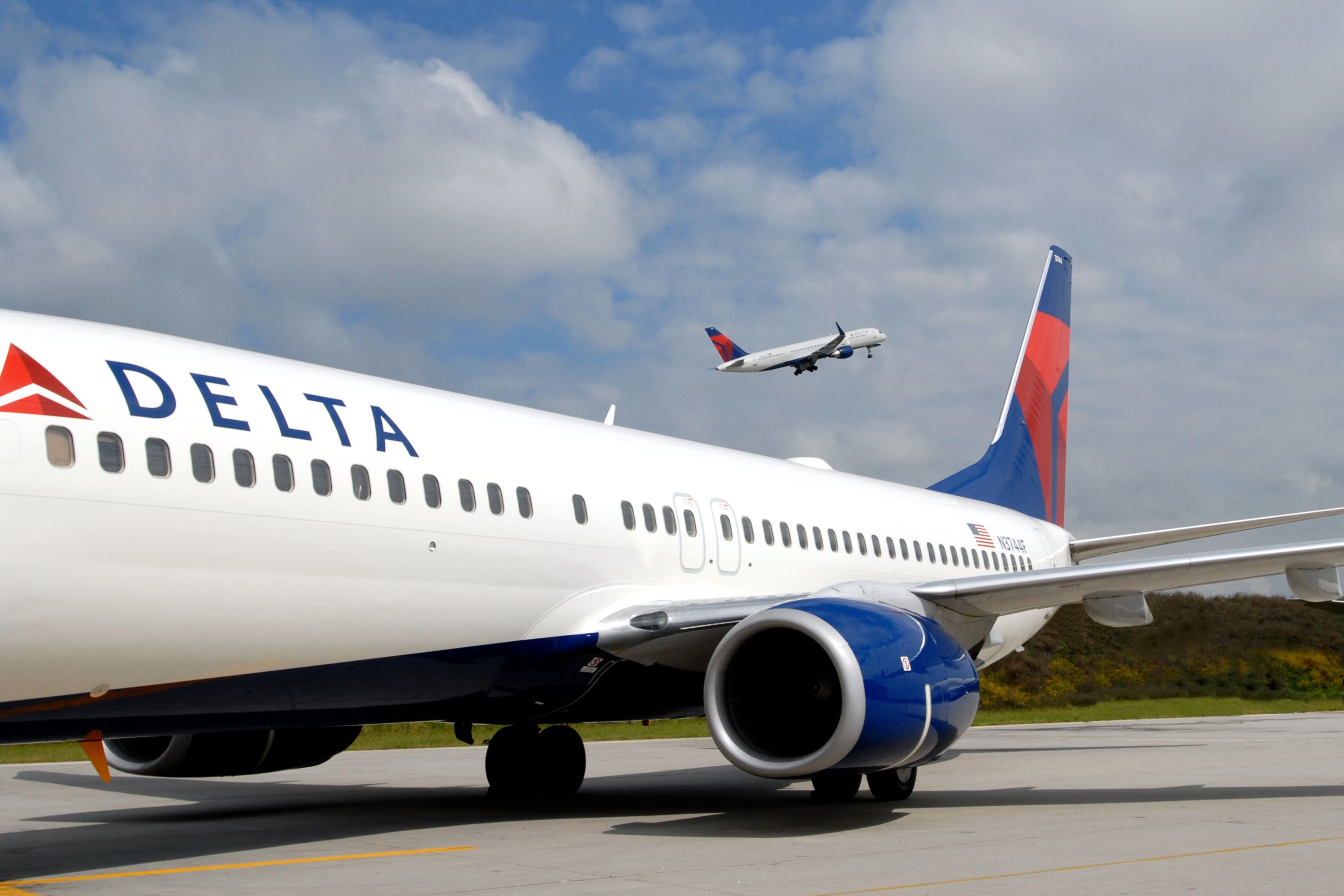 A Closeup of a Delta Air Lines Boeing 737-800 on an airport apron.