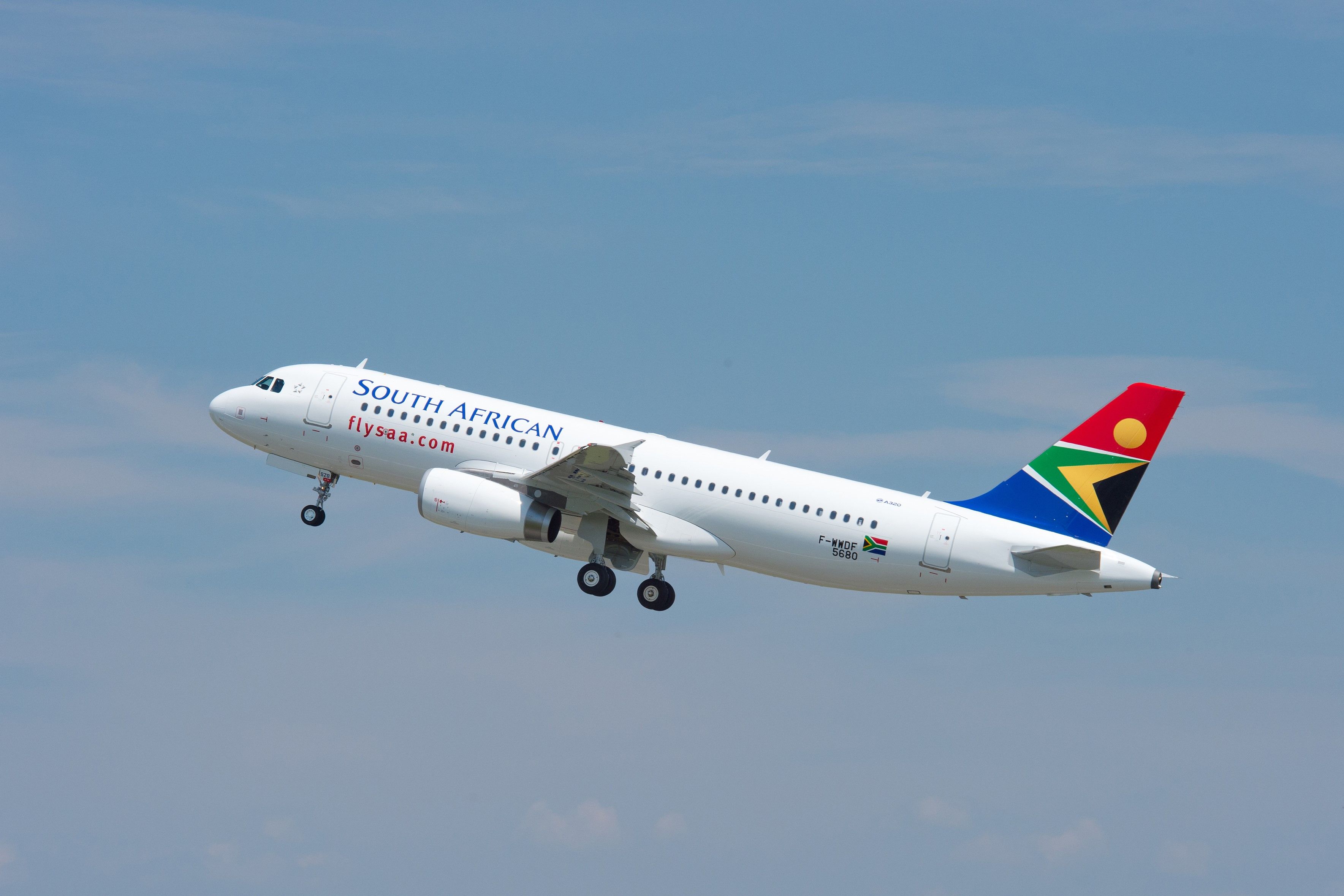 A South African Airways Airbus A320 Flying in the sky.