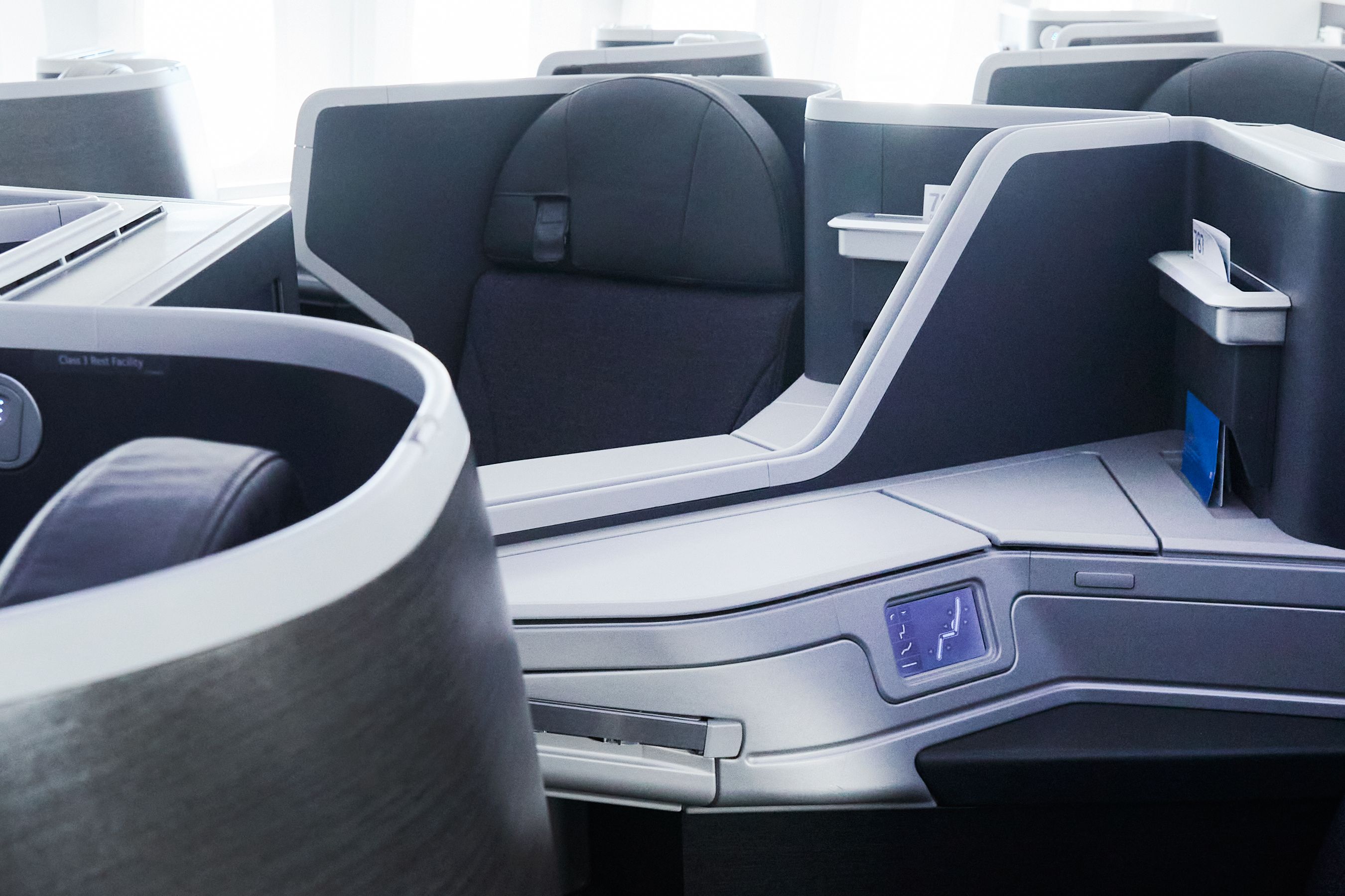 Several American Airlines flagship business class seats.