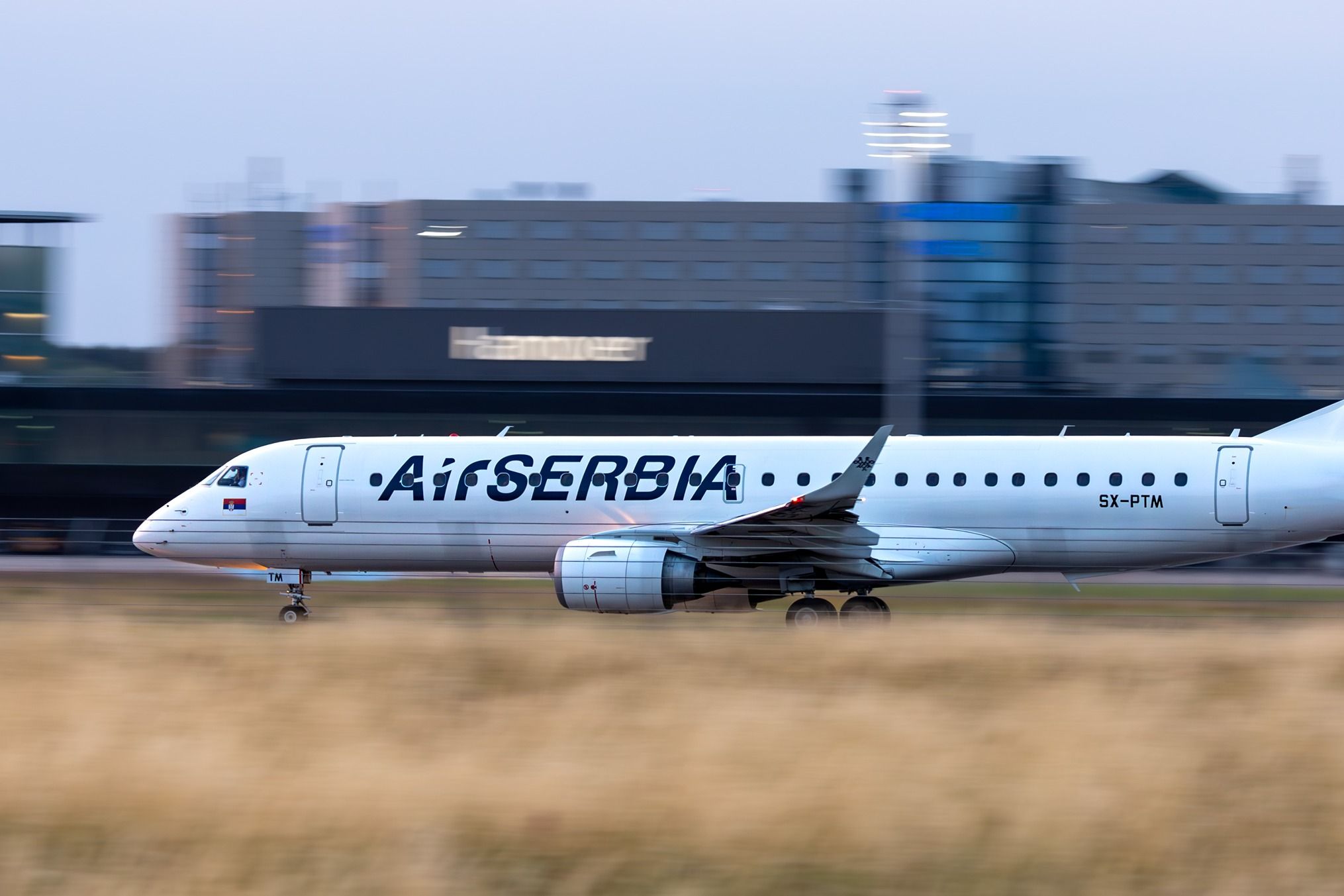 Air Serbia Embraer E195 taking off shutterstock_2325539991
