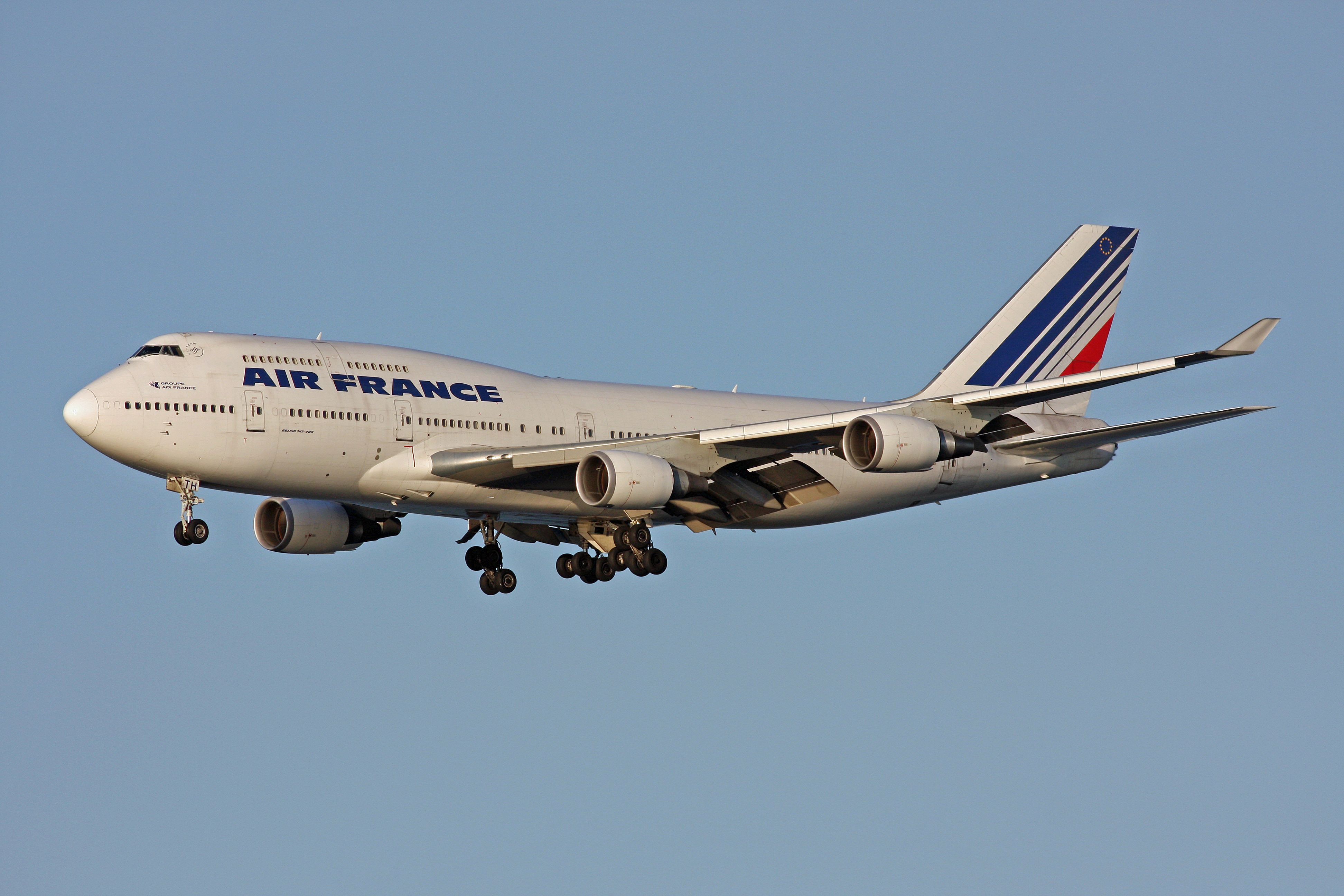 An Air France Boeing 747 flying in the sky.