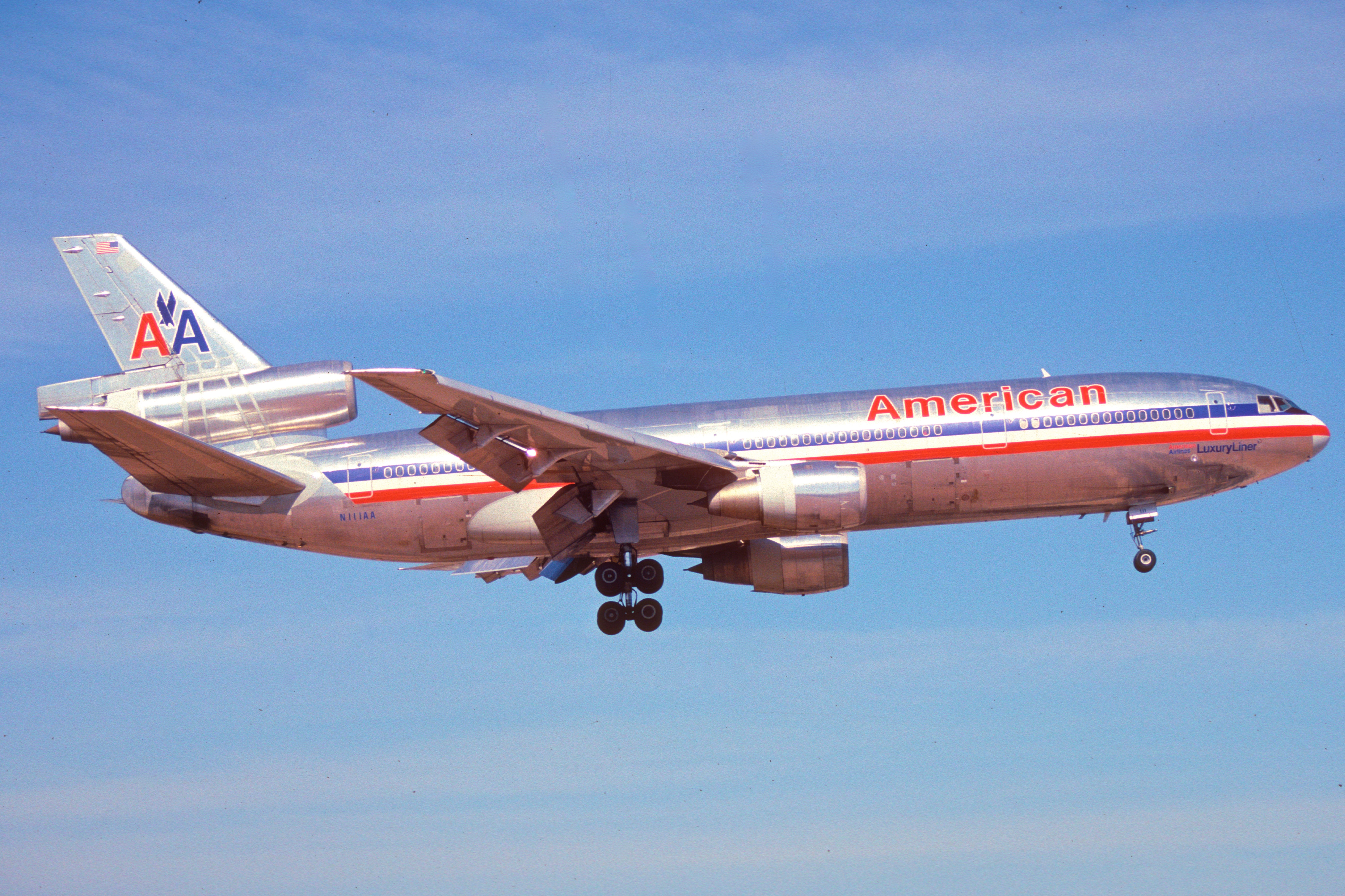 An American Airlines DC-10 flying in the sky.