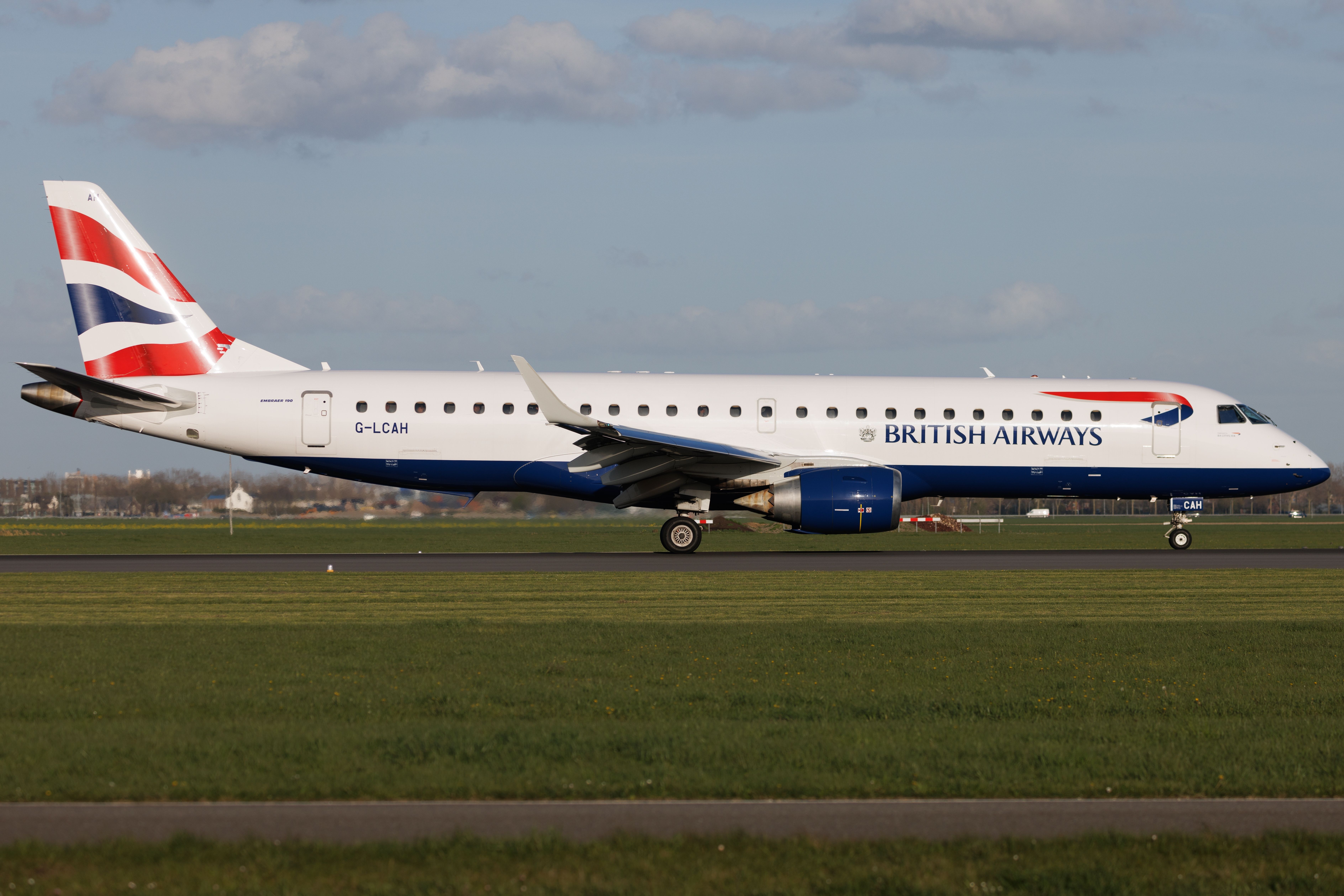 British Airways Embraer E190 at Amsterdam Schiphol Airport AMS shutterstock_2373264063