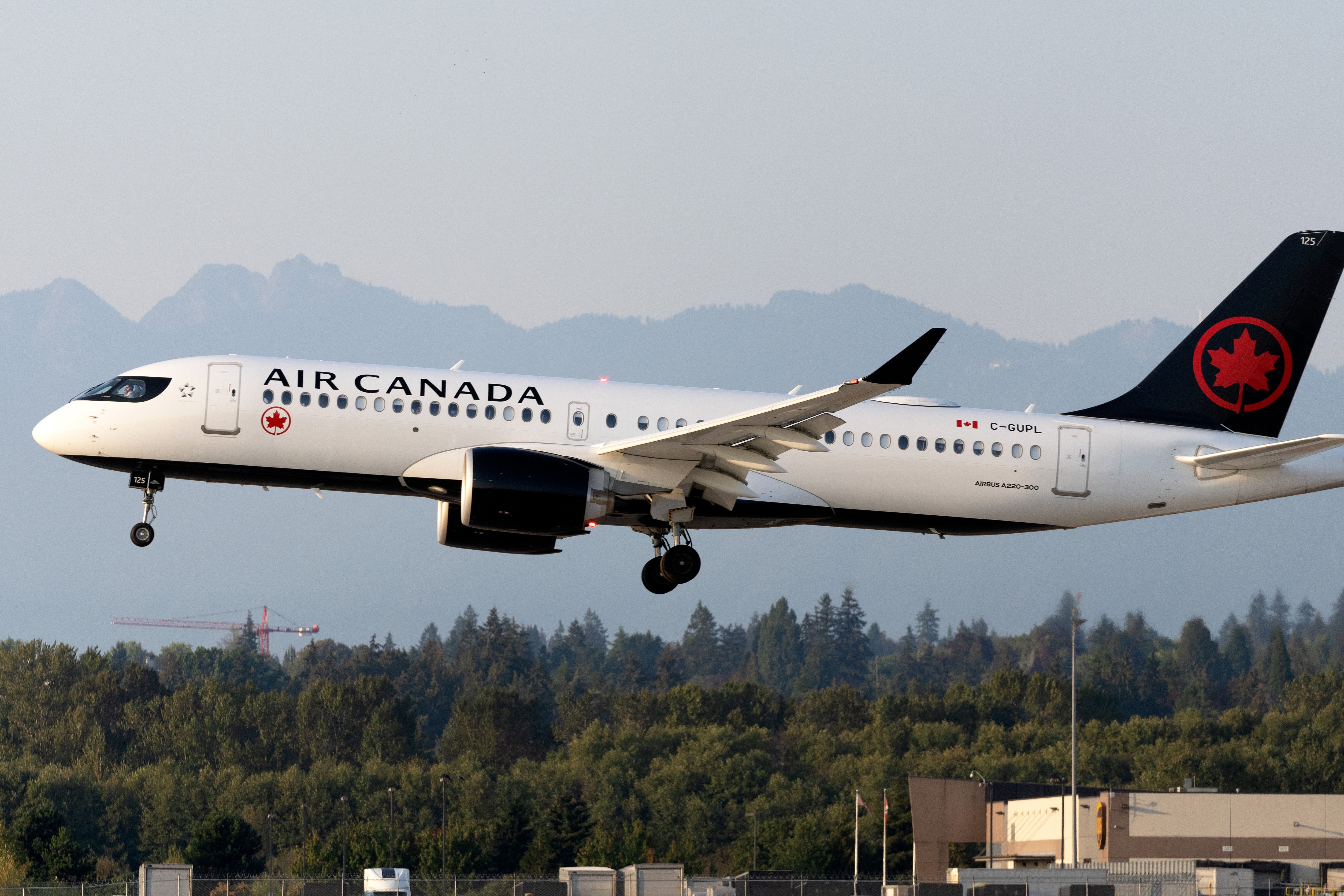 Air Canada Airbus A220-300 (C-GUPL) landing at Vancouver International Airport.