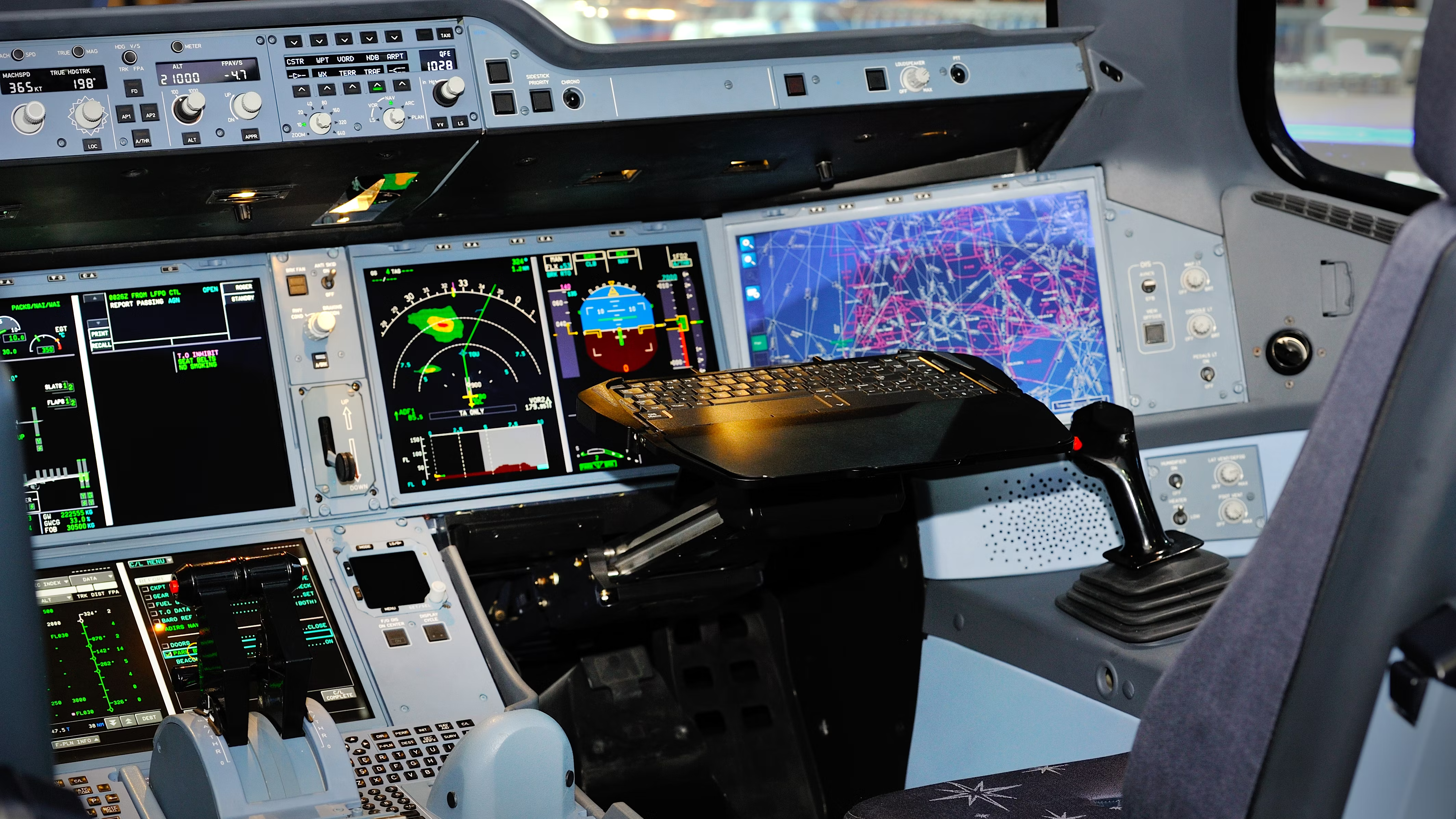 Inside the Cockpit of an Airbus A350 with weather maps showing.
