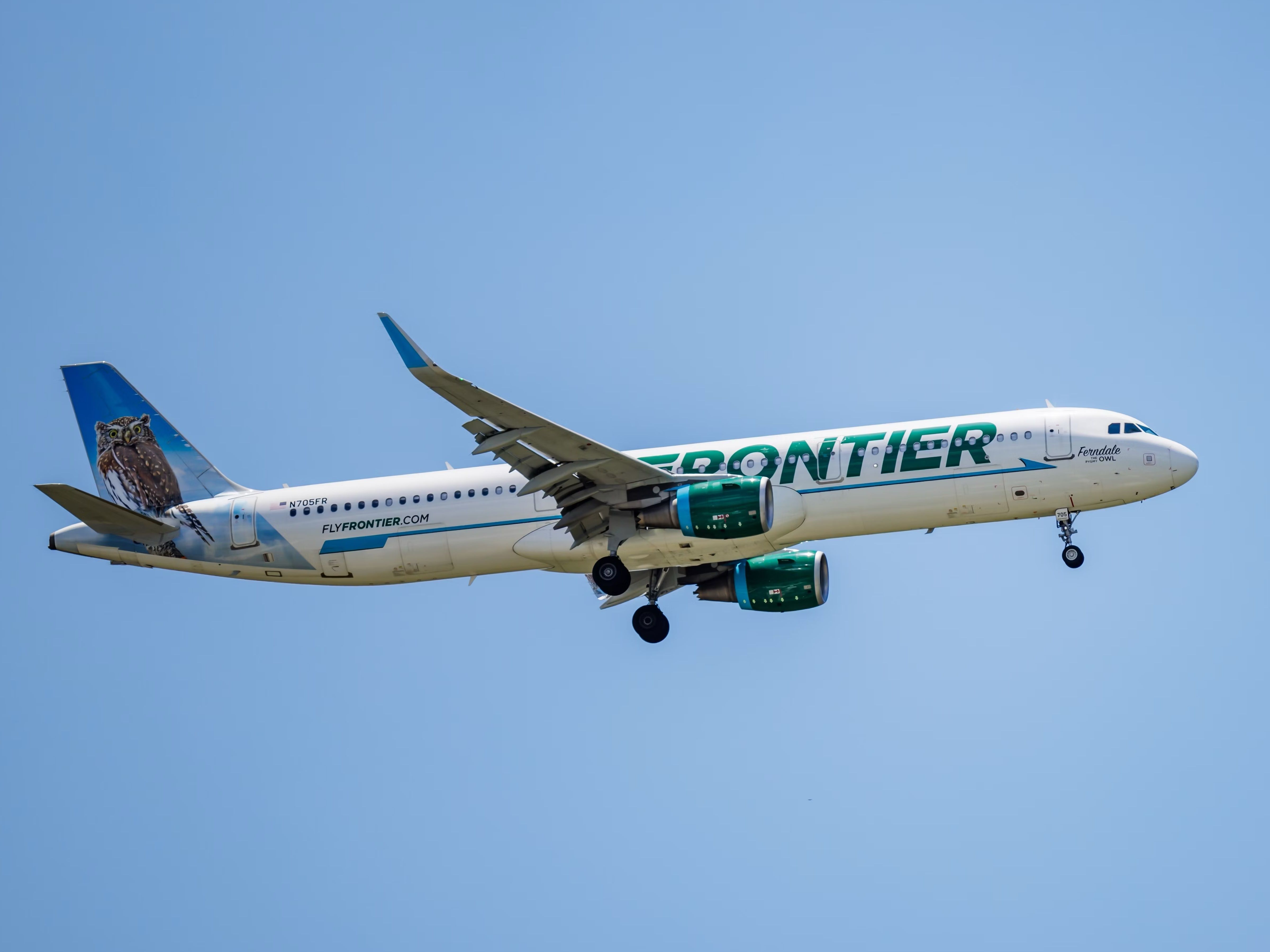 A Frontier Airlines Airbus A321 Flying in the sky.