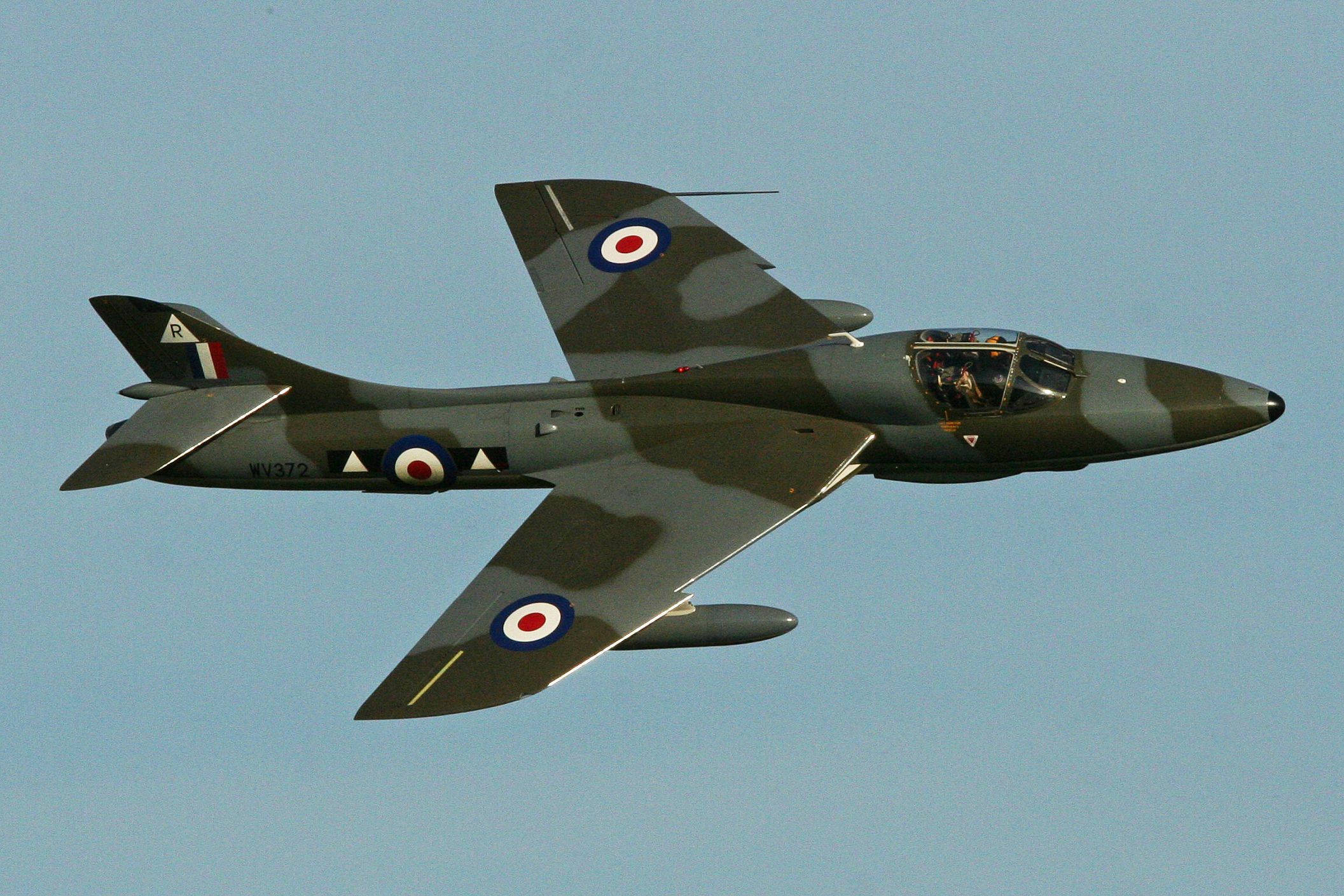 A Hawker Hunter T7 Flying in the sky.