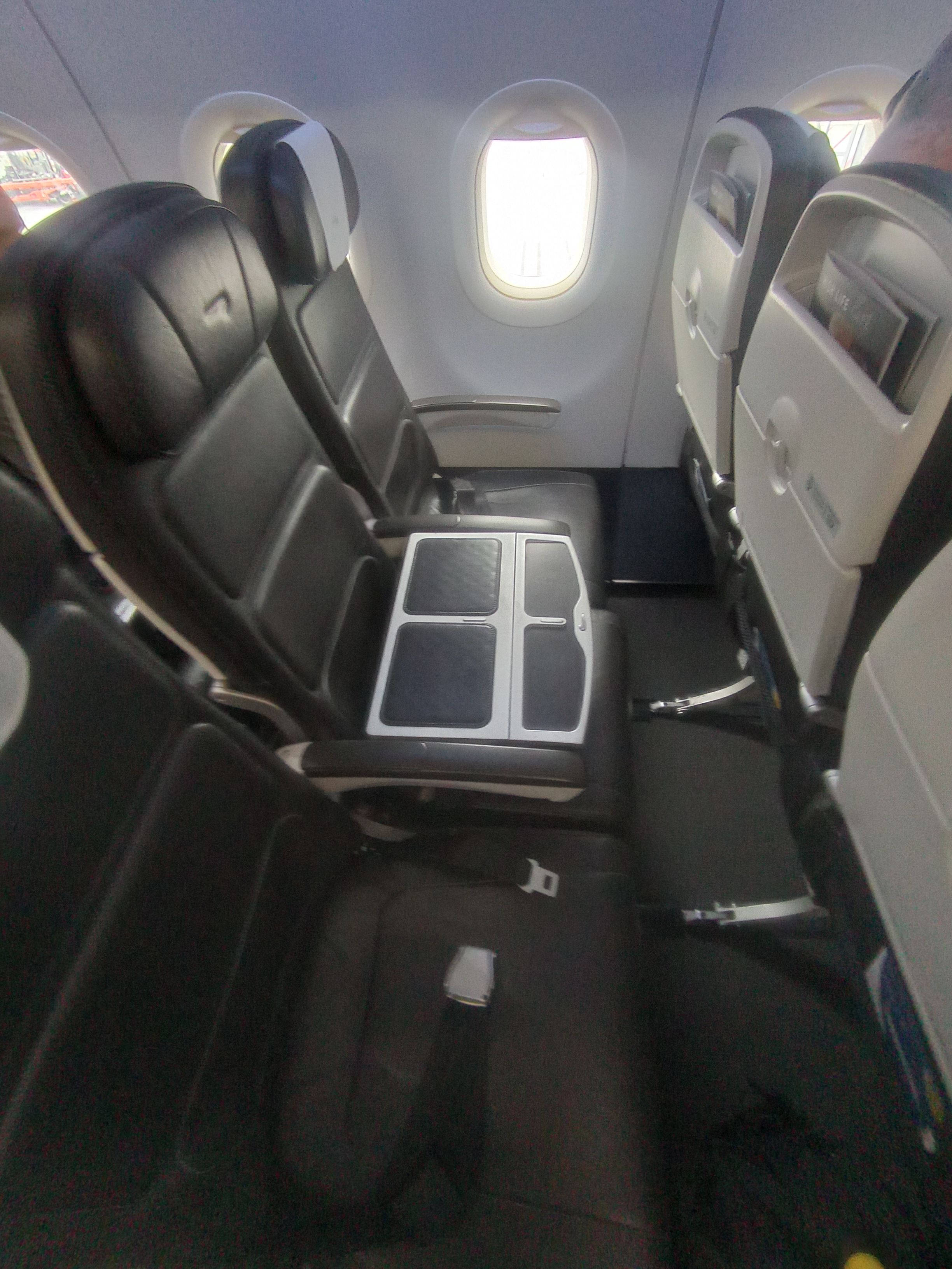 A row of seats in a British Airways Airbus A320.