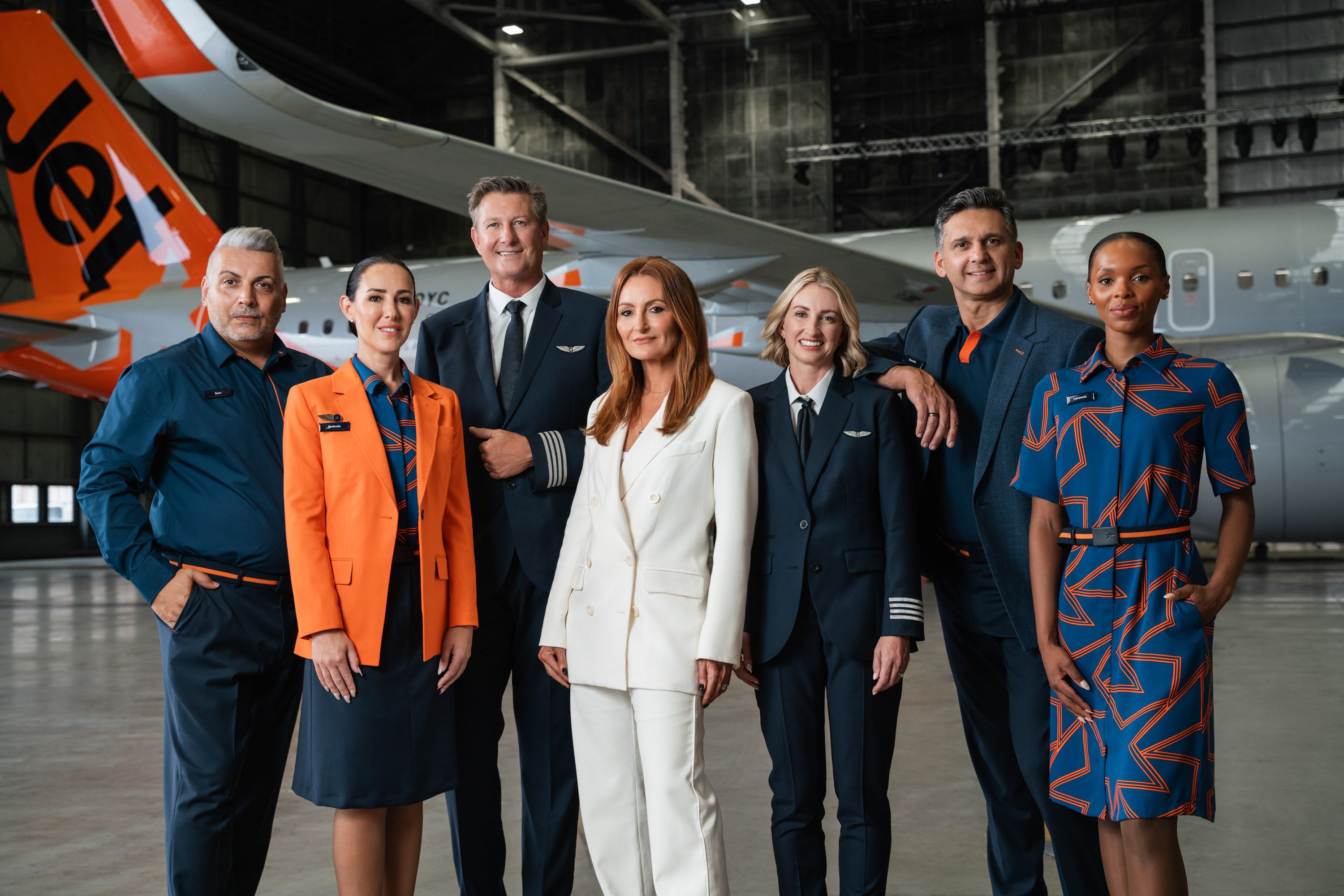 Jetstar crew with uniform designer Genevieve Smart