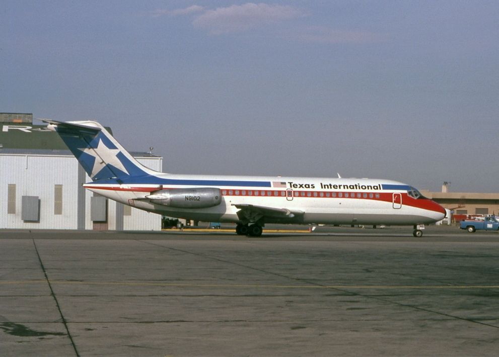 A Texas International Airlines DC-9 on an airport apron.