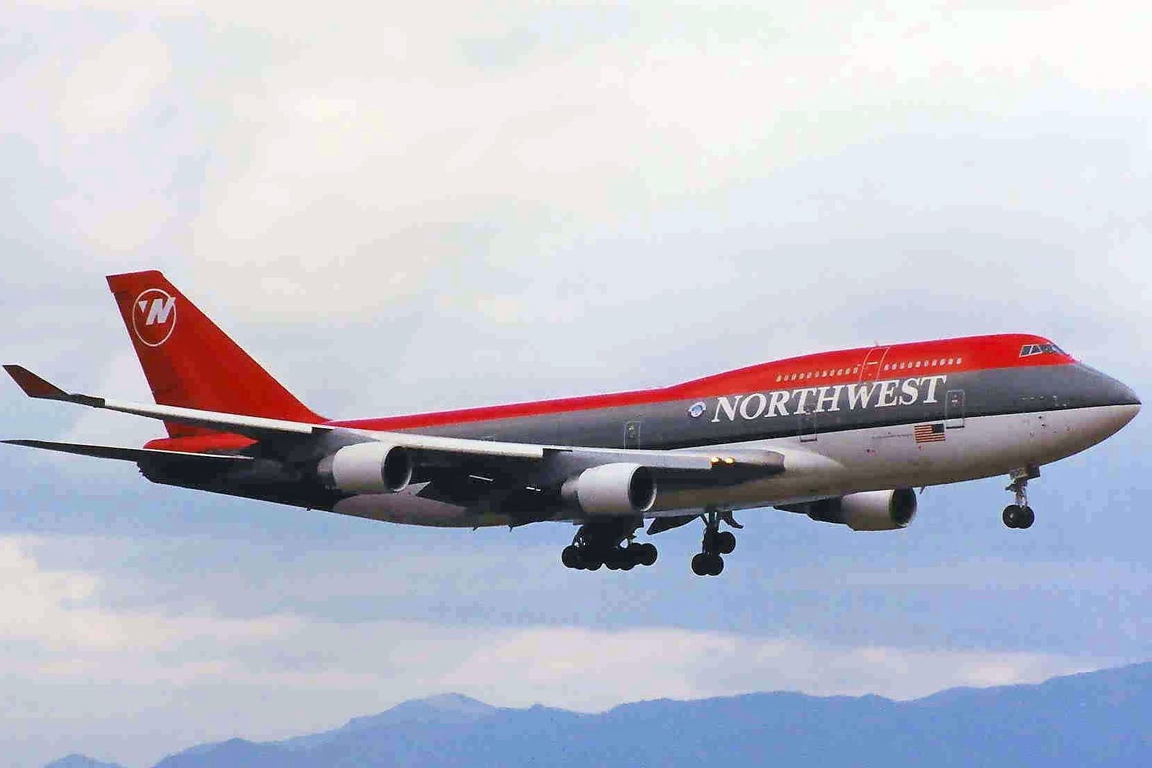A Northwest Airlines Boeing 747 Flying in the sky.