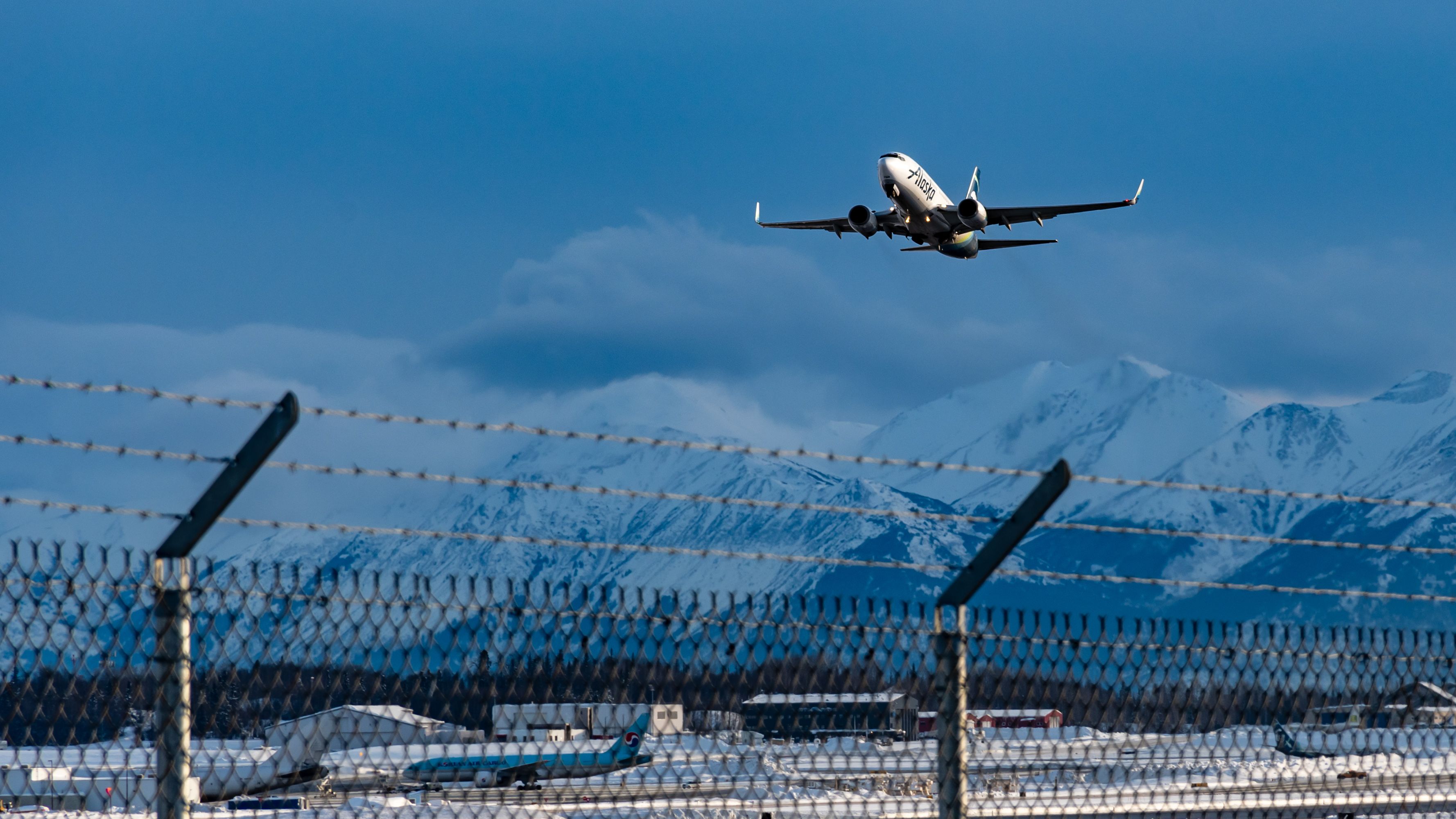 An Alaska Airlines 737-700 Taking off from Anchorage.