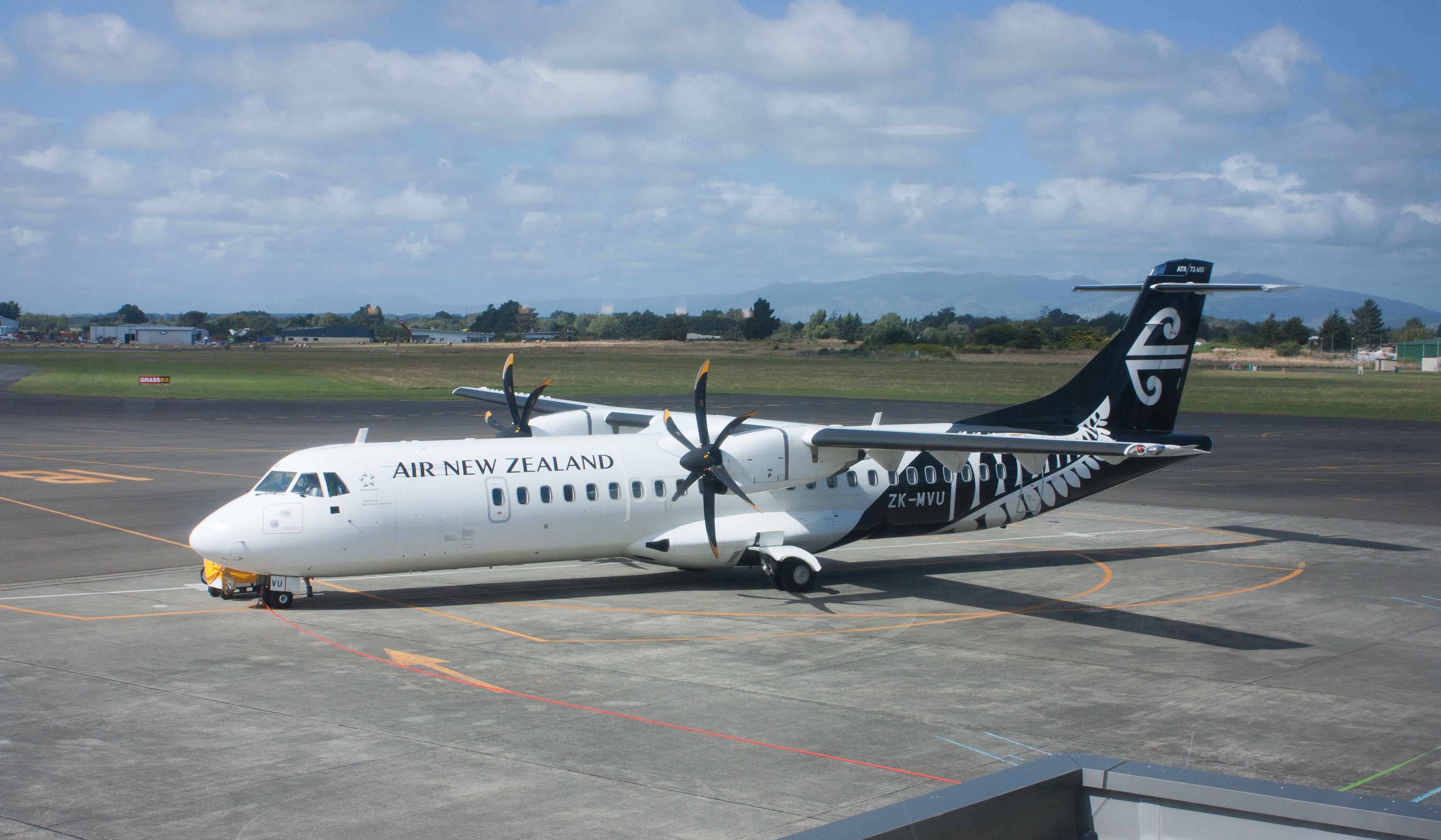 An Air New Zealand ATR 72 on an airport apron.