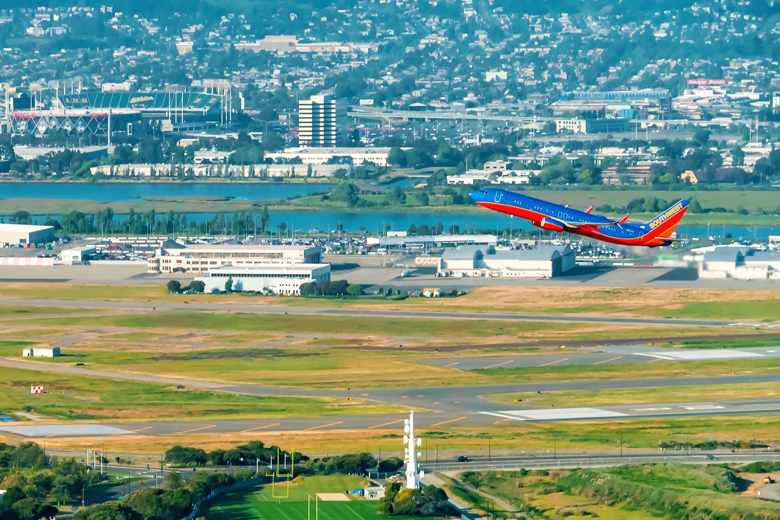 A Southwest Airlines plane above Oakland Airport OAK