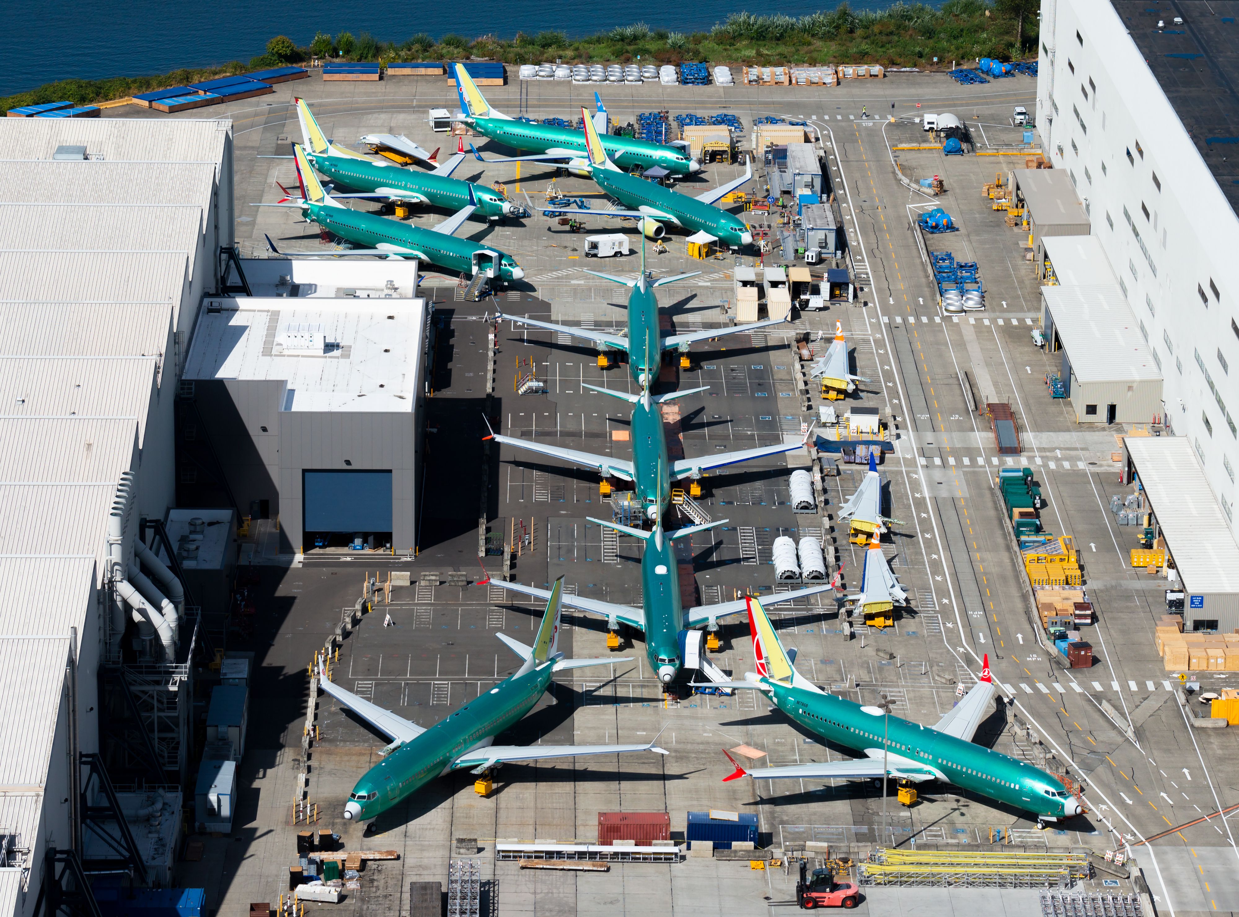 Multiple Boeing 737 MAX and NG parked outside the company factory at Renton Airport.