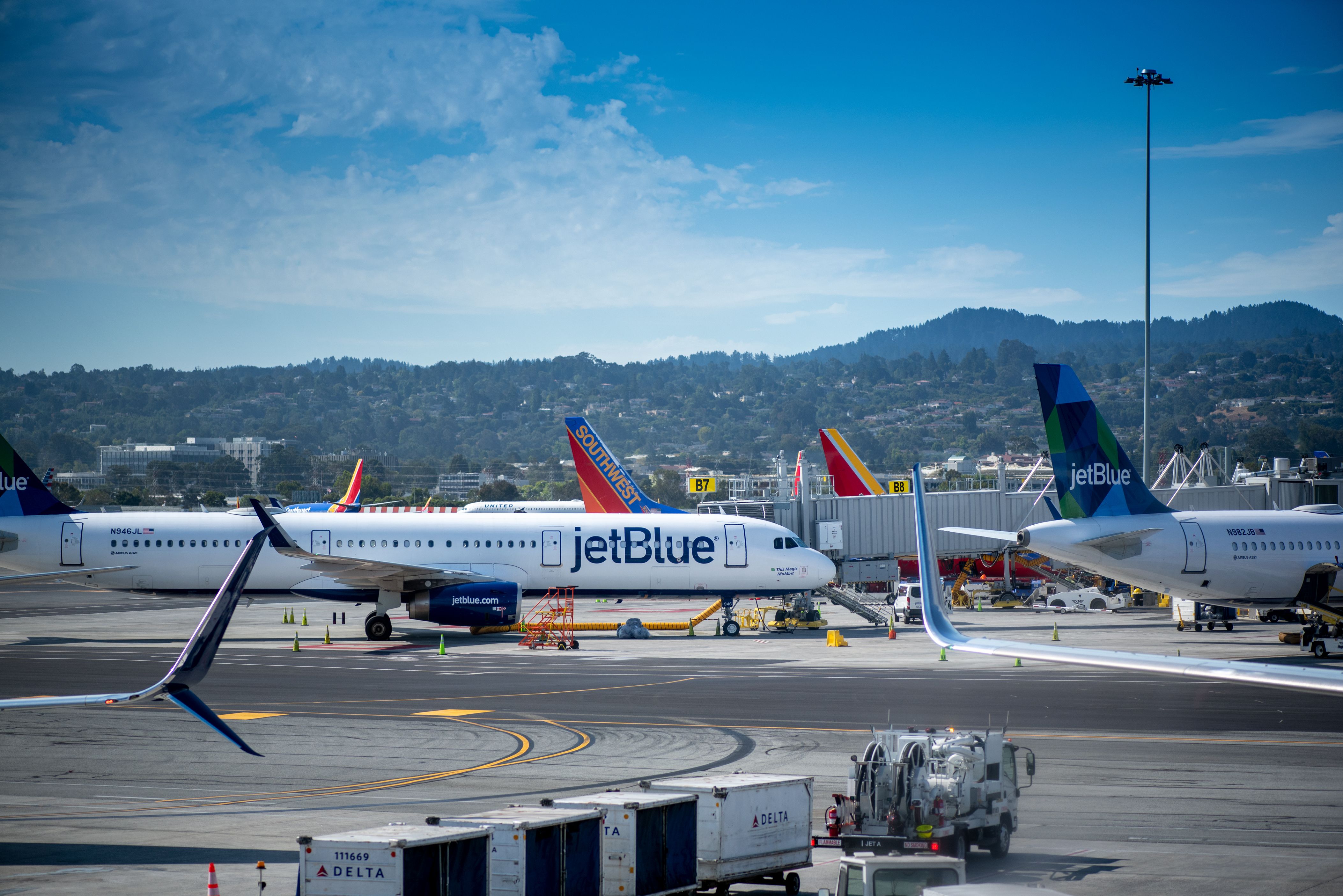 A Jetblue aircraft on the apron at San Francisco Airport.
