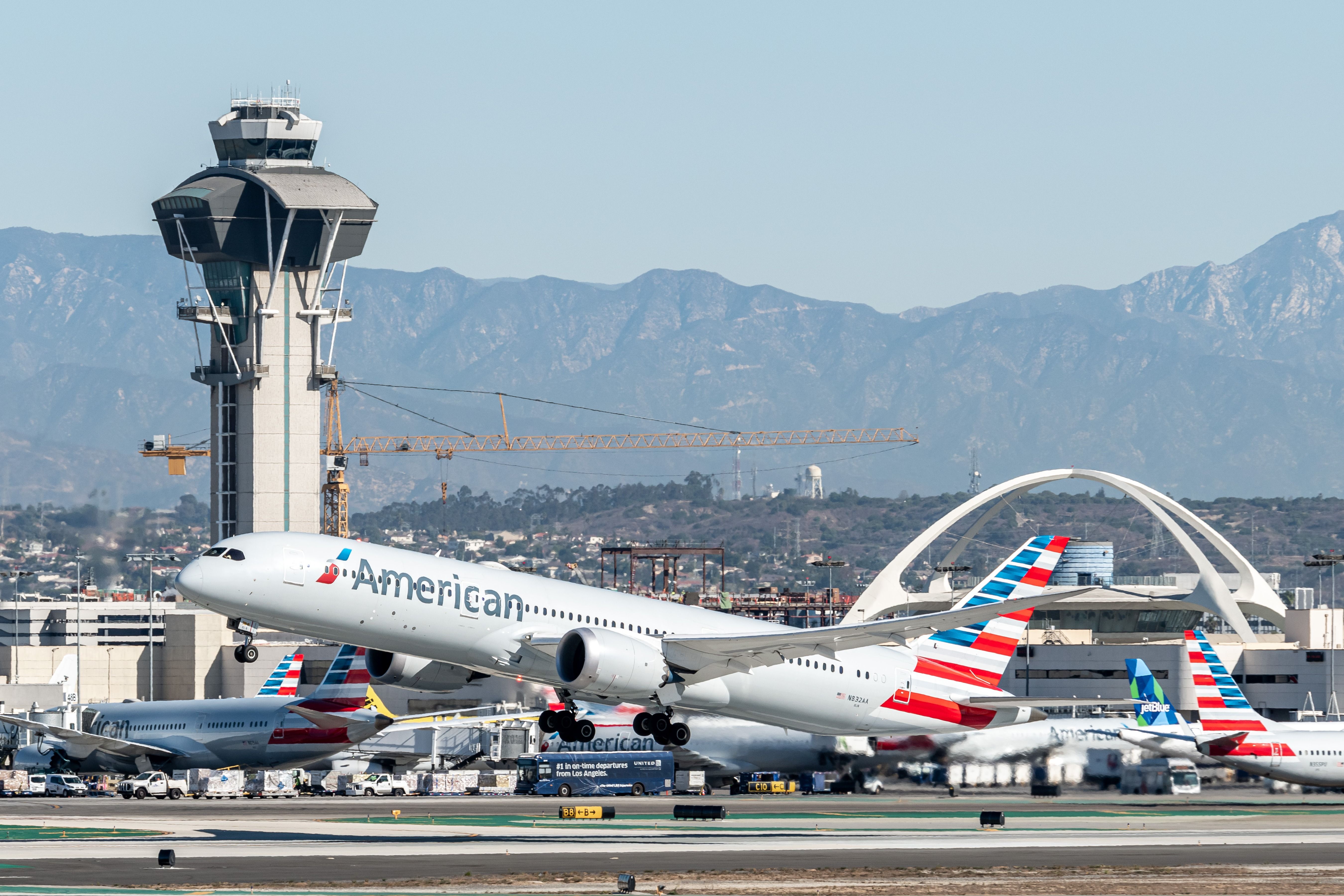 An American Airlines Boeing 787-9 Dreamliner departing from Los Angeles International Airport.