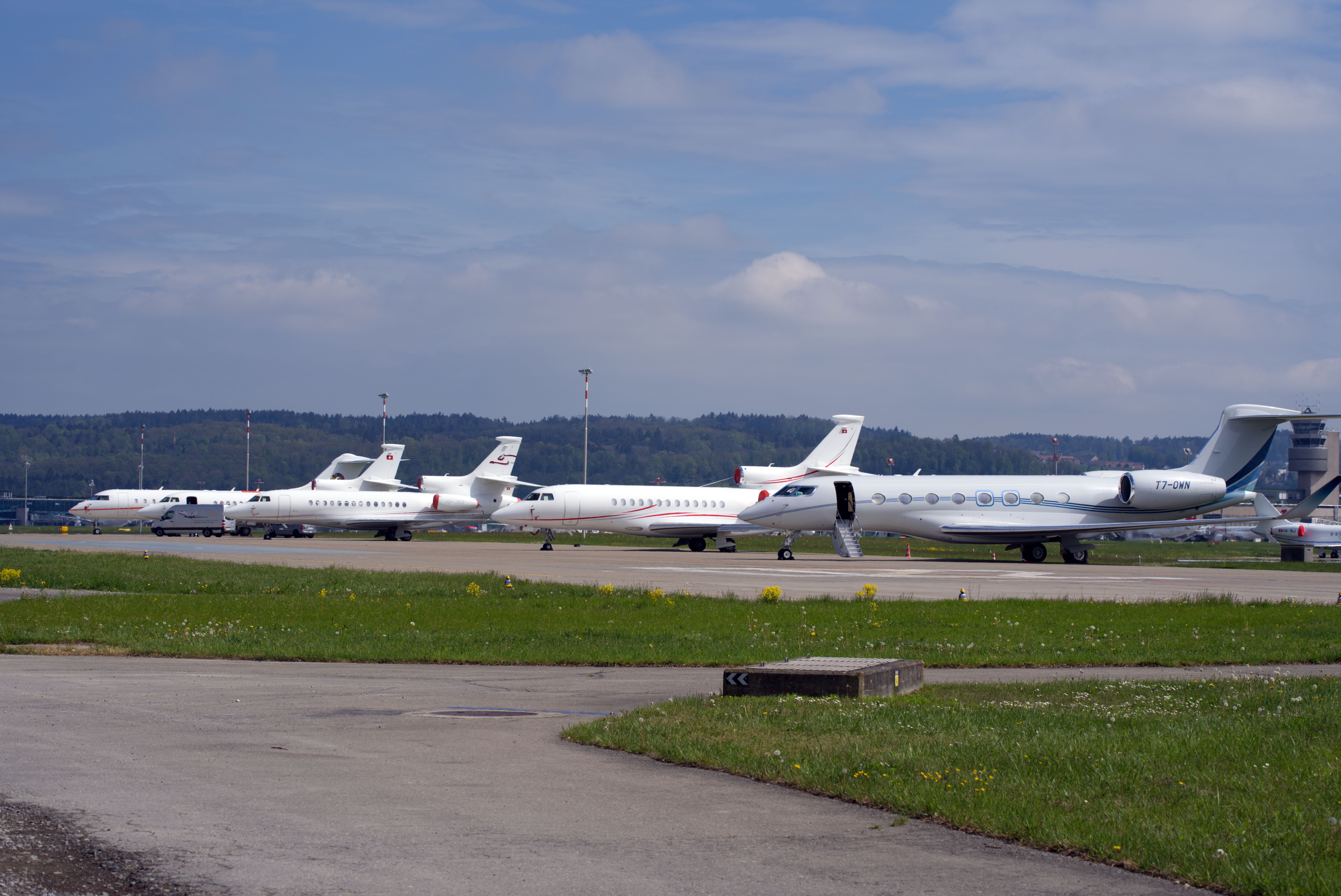 Private jets lined up at an airport in the US