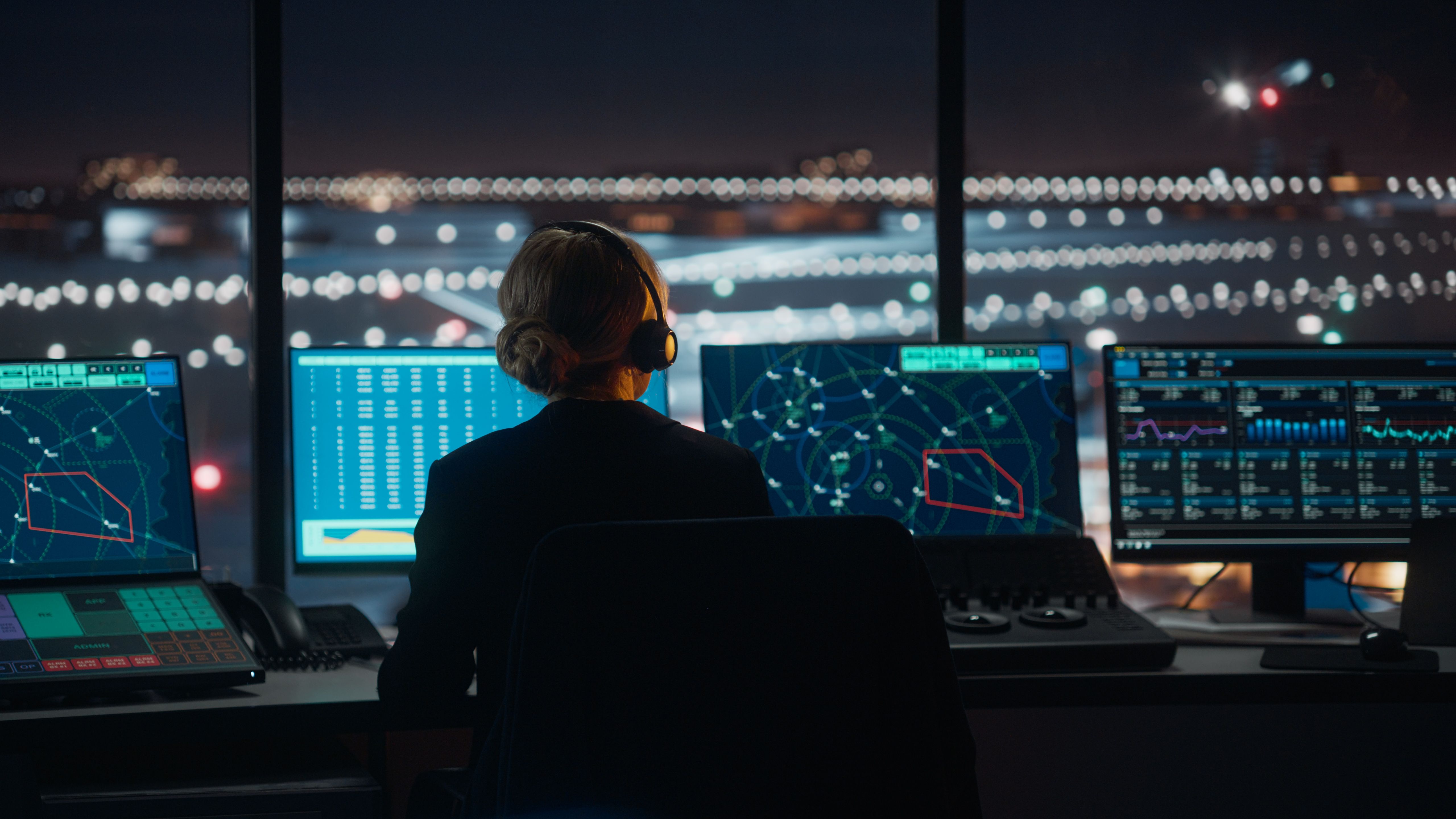 An Air traffic controller working in the tower.