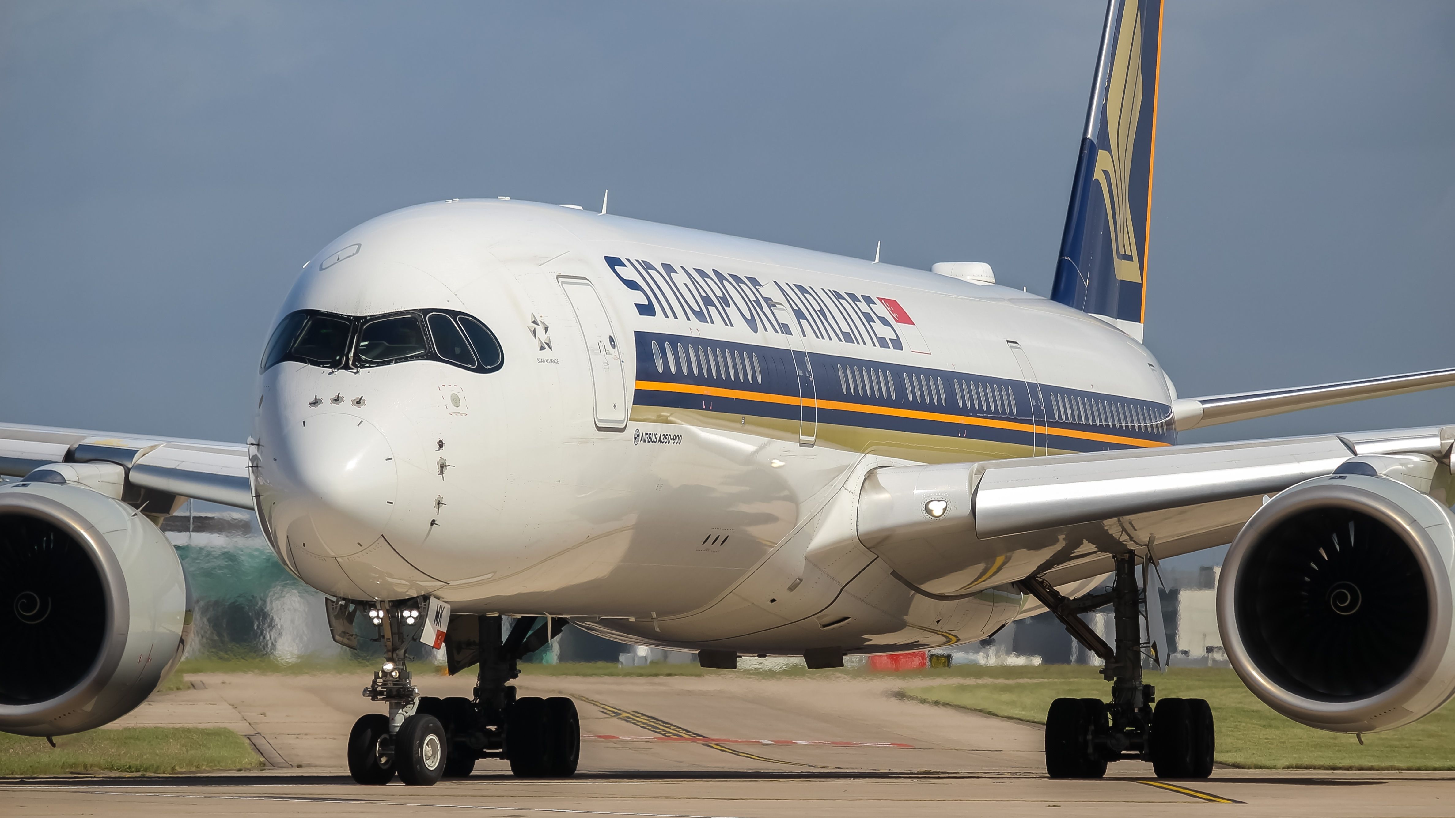 A Singapore Airlines Airbus A350 on an airport apron.