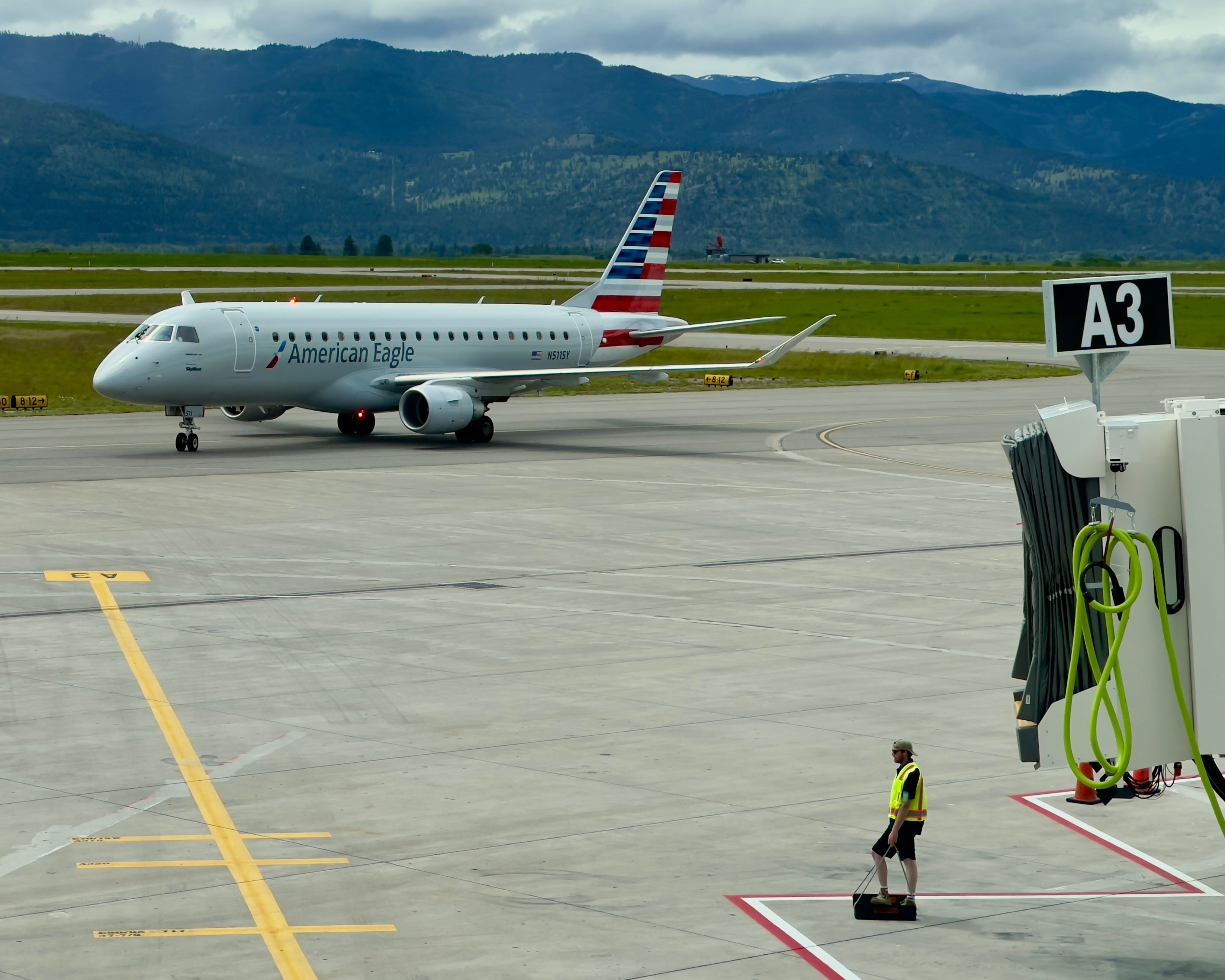 American Eagle (SkyWest Airlines) Embraer E175 (N511SY) pulling into the gate at Missoula Montana Airport.