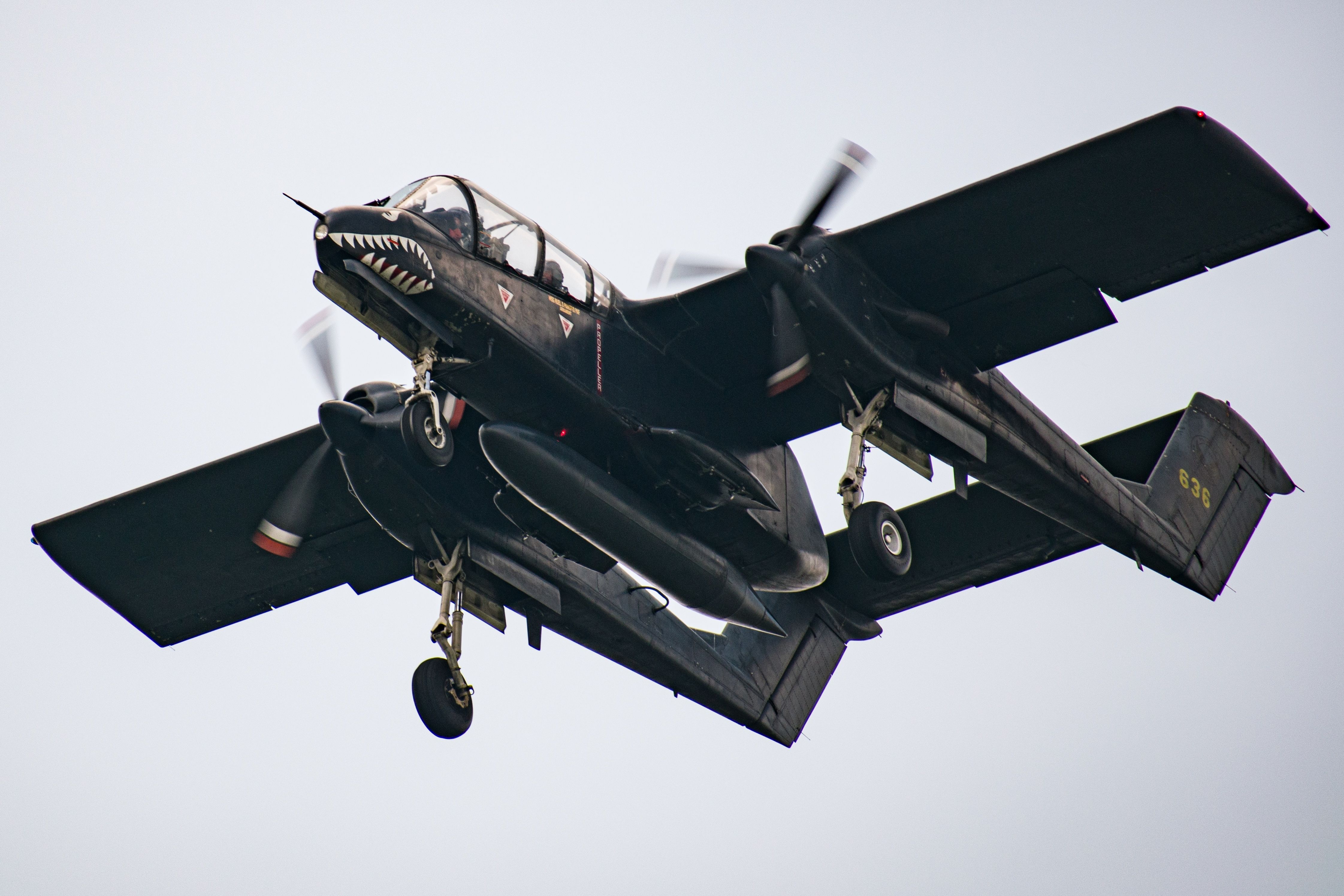 A North American OV-10 Bronco flying in the sky.
