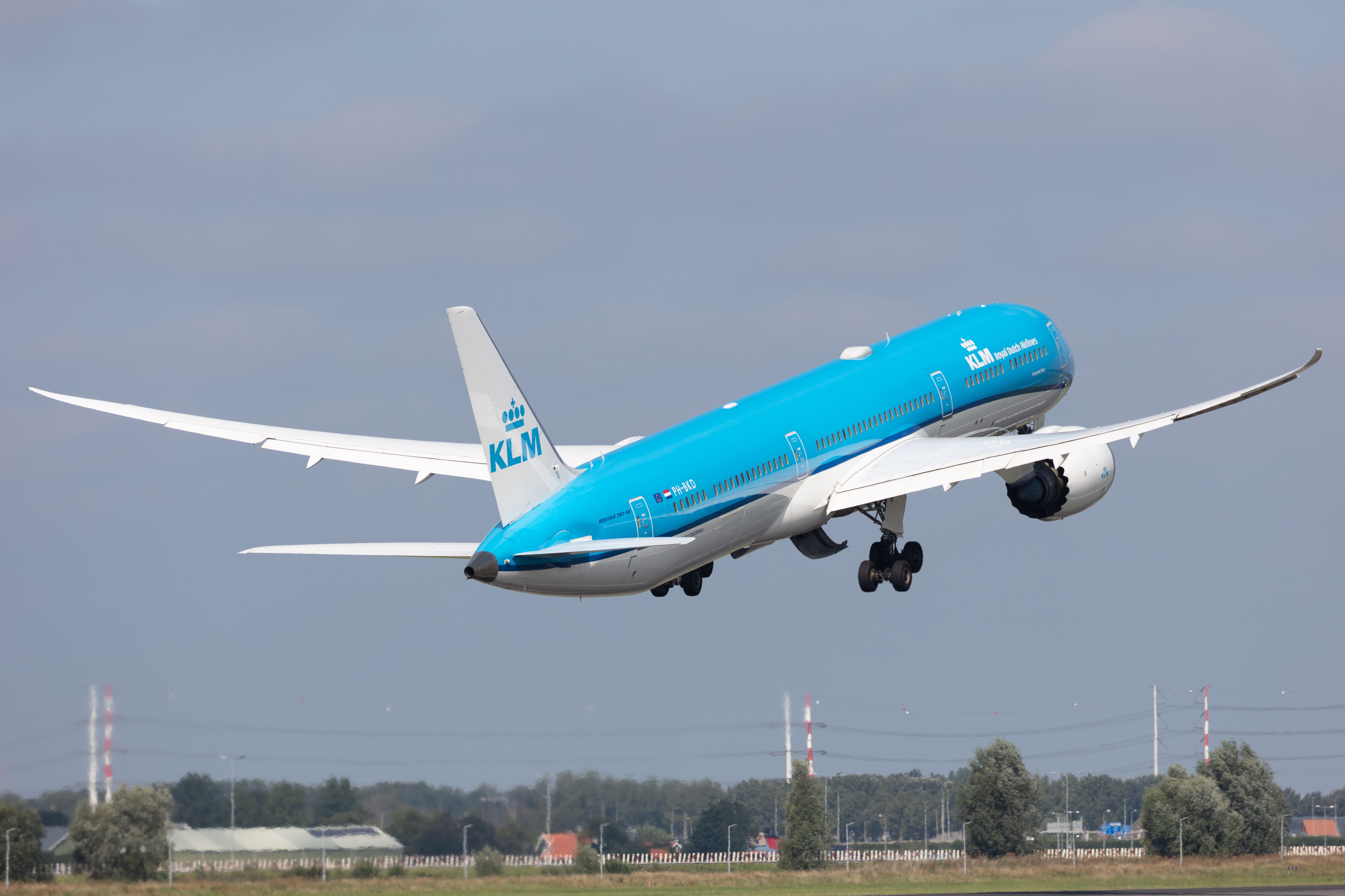 KLM Royal Dutch Airlines Boeing 787-10 Dreamliner departing from Amsterdam Schiphol Airport.
