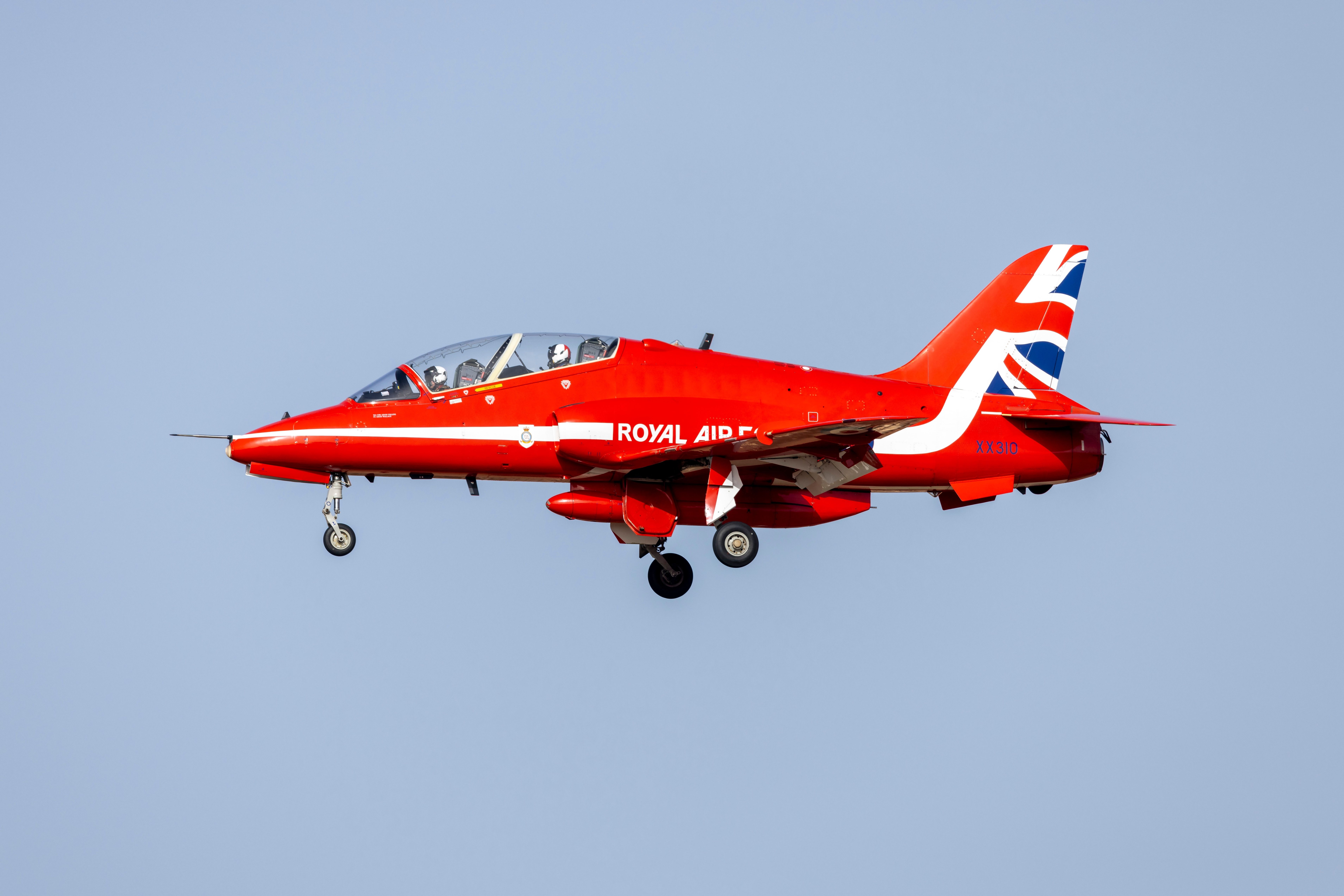 A Red Arrows BAE Hawk Flying in the sky.