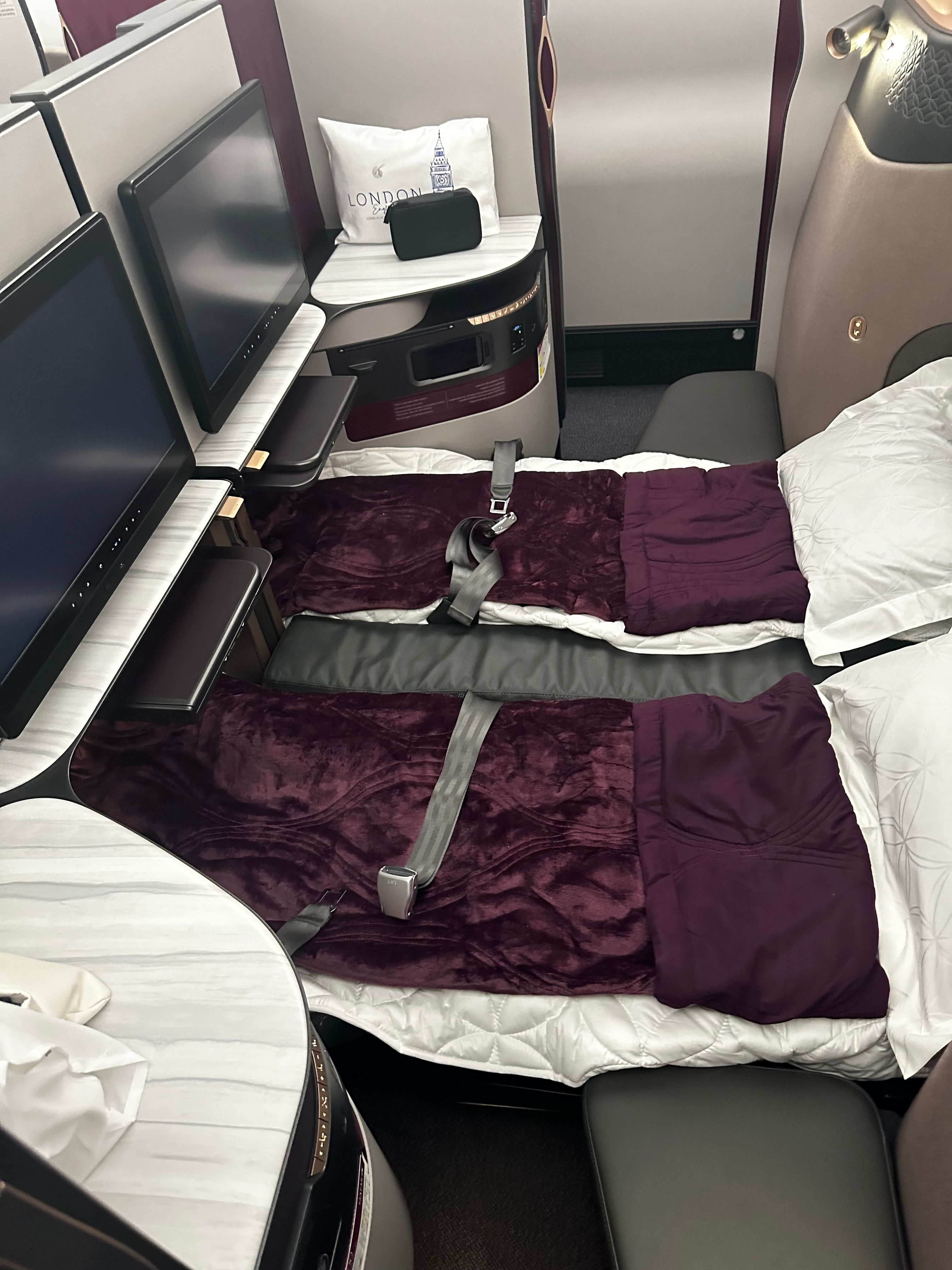 Two Qatar Airways QSuite beds made.
